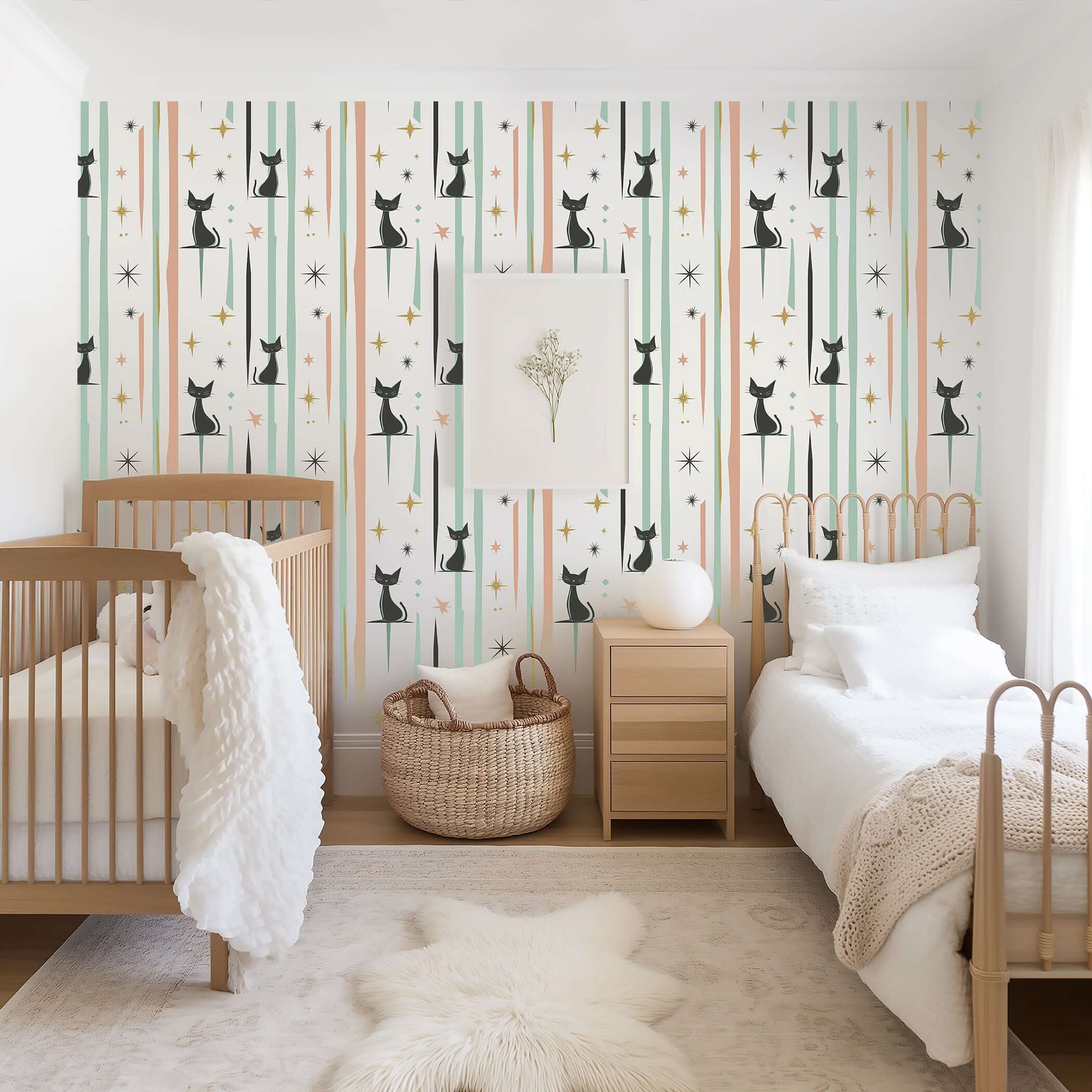 Retro mid-century modern 'Cosmic Cats' wallpaper in pastel tones, perfect for nursery or playroom decor with sleek black kittens.