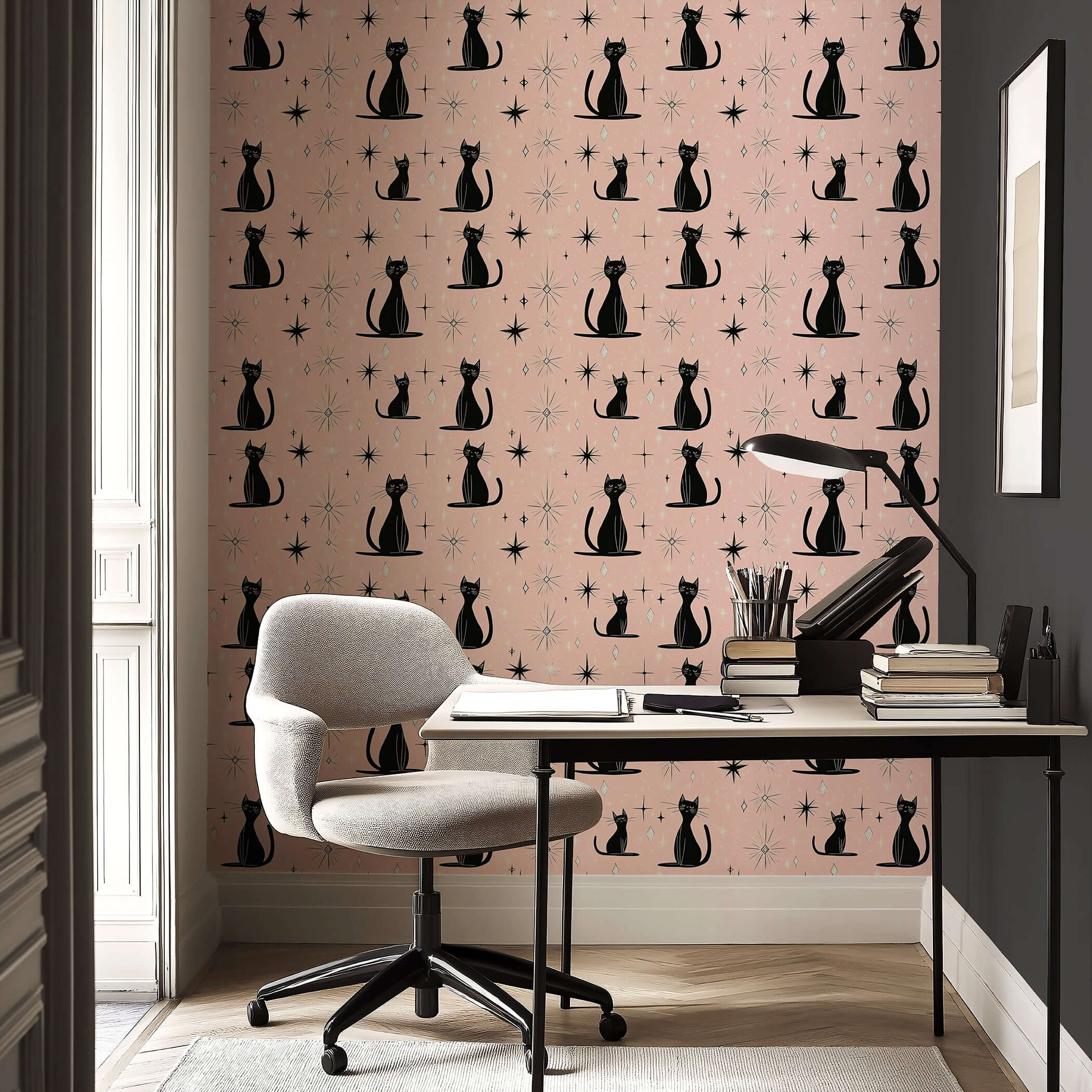 Starry-Eyed Kitty Wallpaper featuring black cats amidst vintage starbursts on a pink background for nurseries and playrooms.