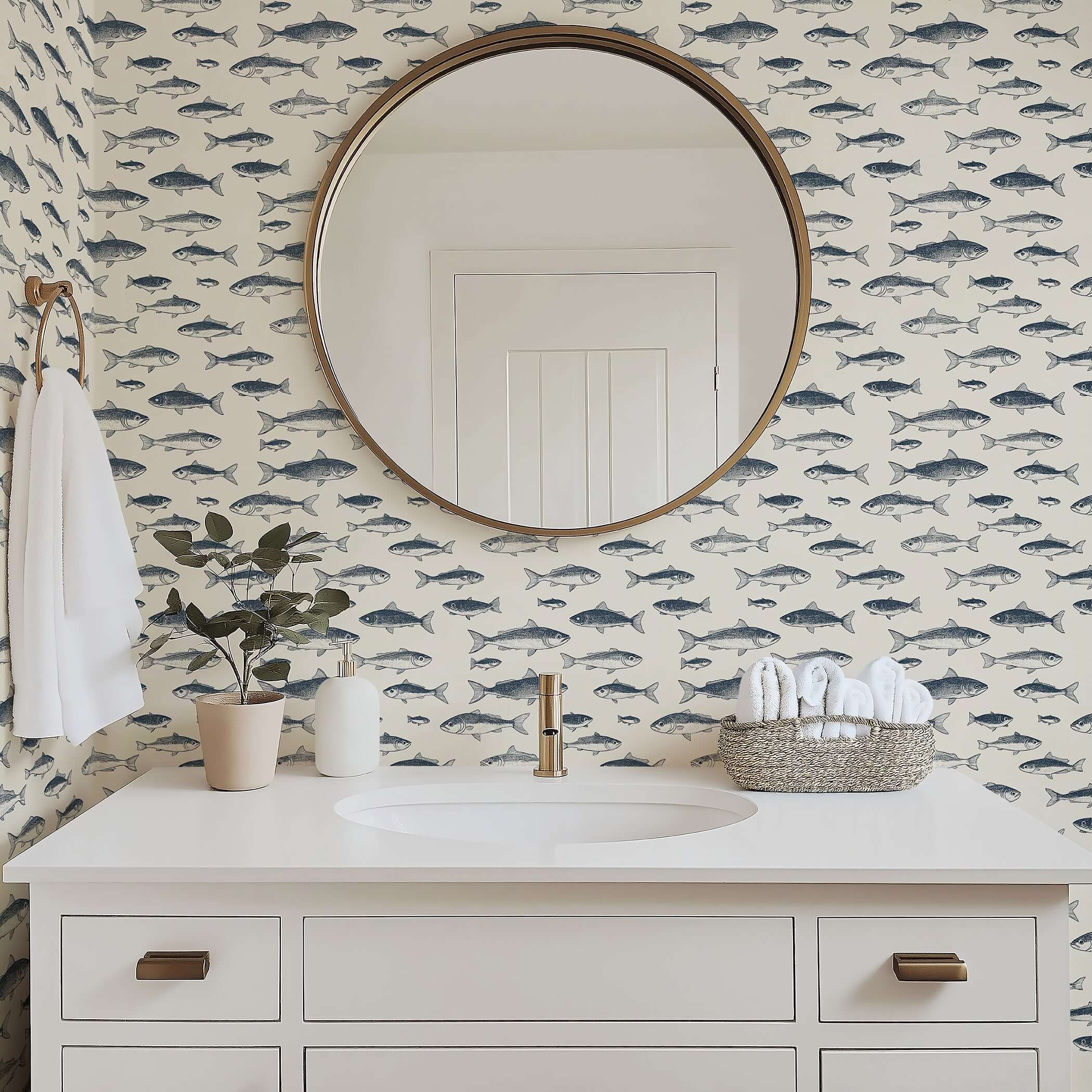Elegant coastal bathroom featuring Vintage Fisherman wallpaper with hand-drawn fish illustrations, enhancing nautical charm.