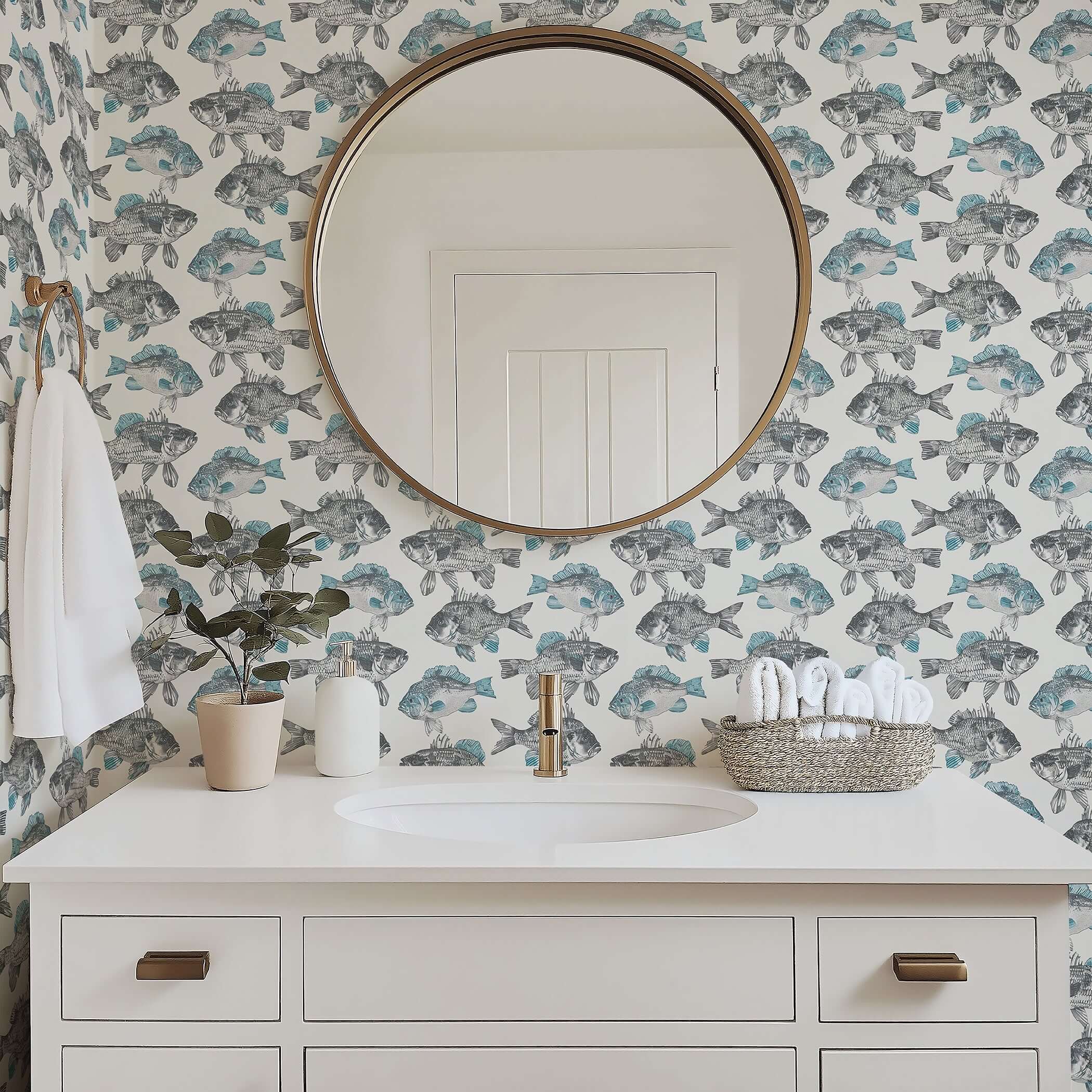 Bathroom with Coastal Currents wallpaper featuring hand-drawn fish, providing a serene nautical and coastal design backdrop.
