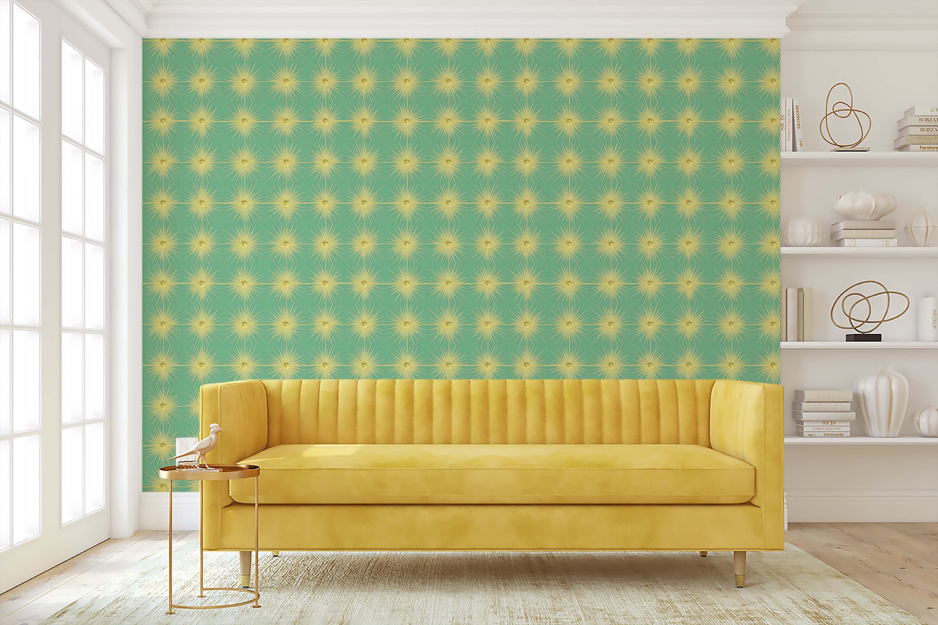 Vintage Sunburst Charm wallpaper with gold starburst on teal, enhancing a mid-century-modern living room with a yellow sofa.