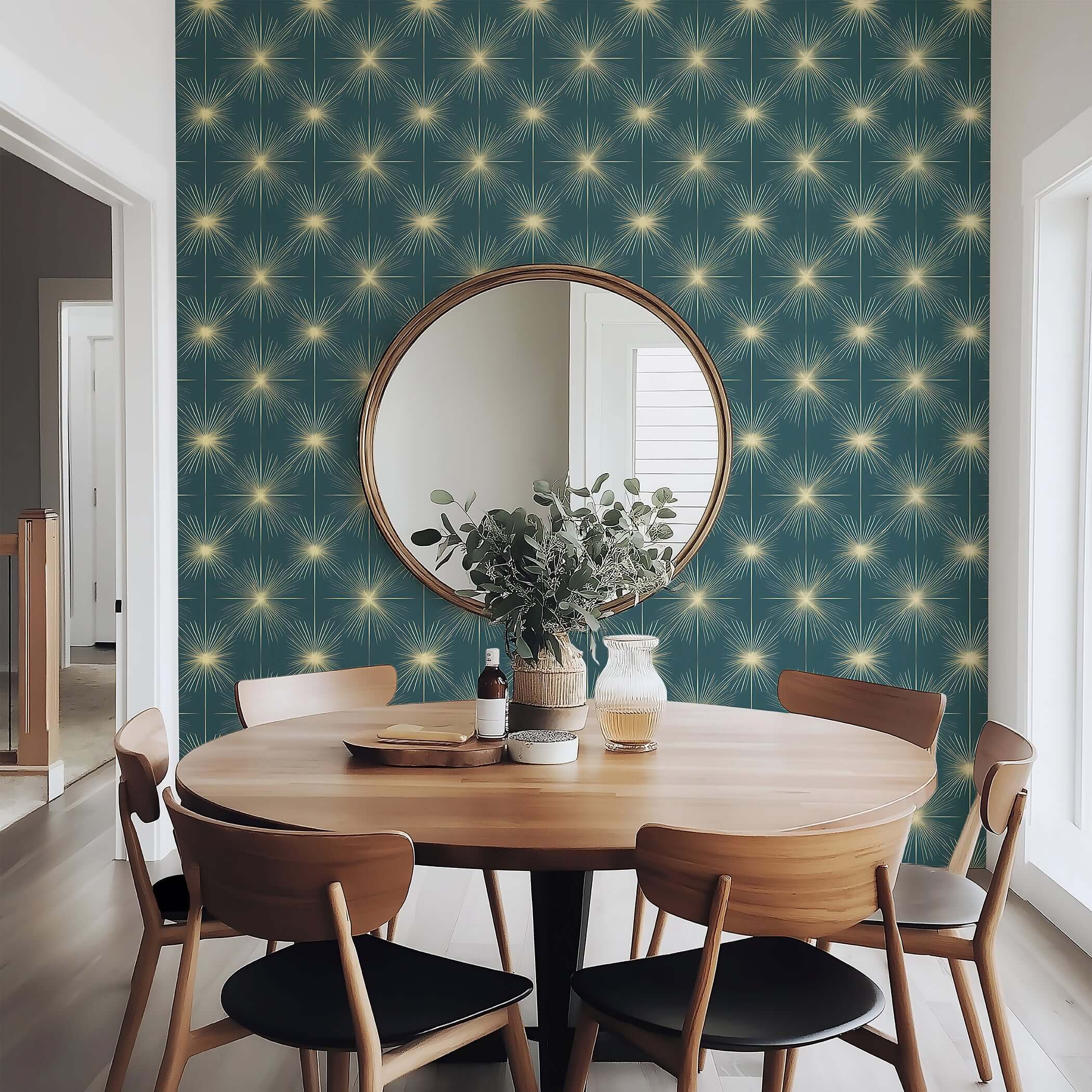 Dining room with Celestial Gold Sparkle wallpaper featuring golden starbursts on teal-blue, retro Mid-Century Modern style.