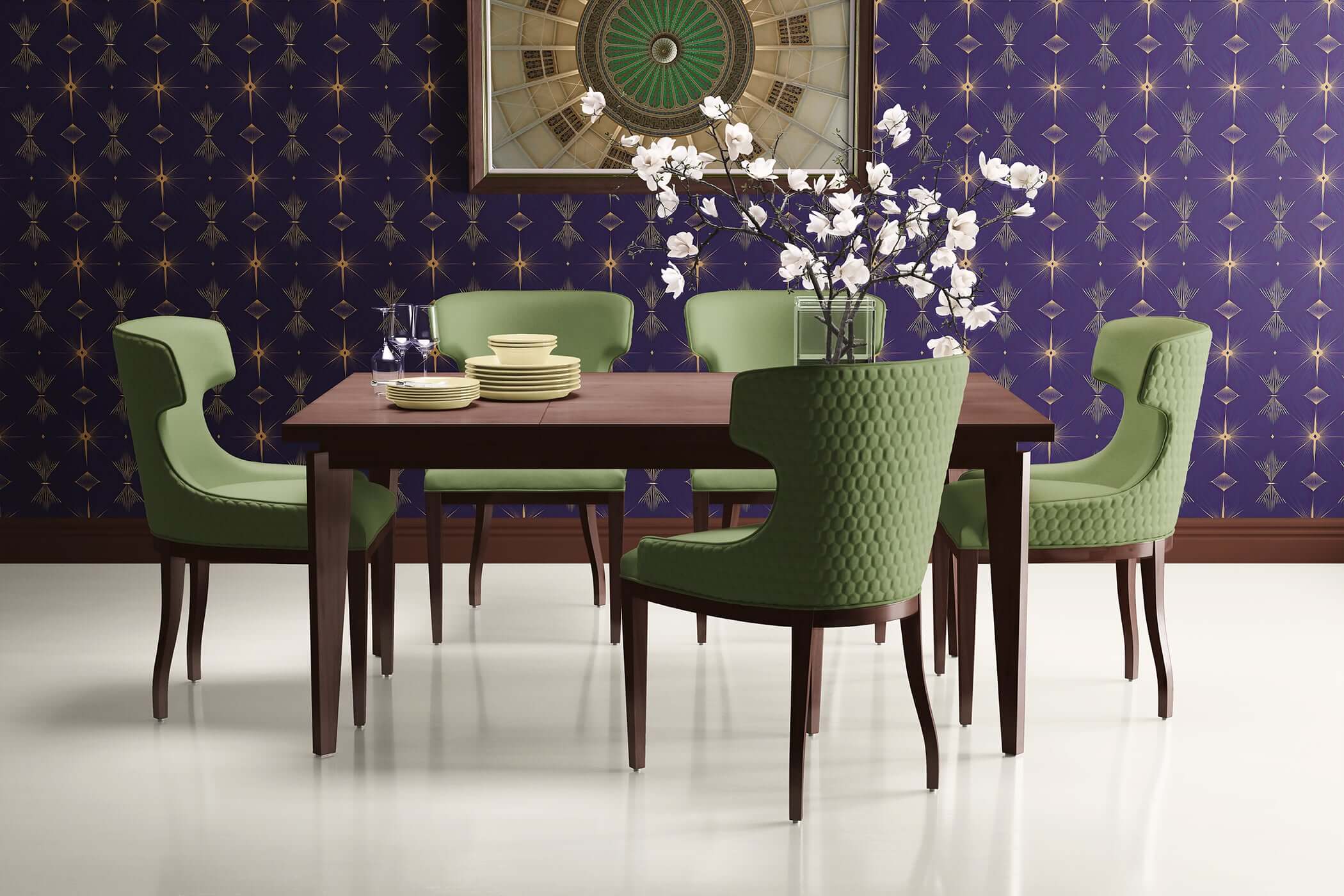 Dining room with Deco Twilight Art Deco wallpaper featuring geometric patterns, green chairs, and wooden table.