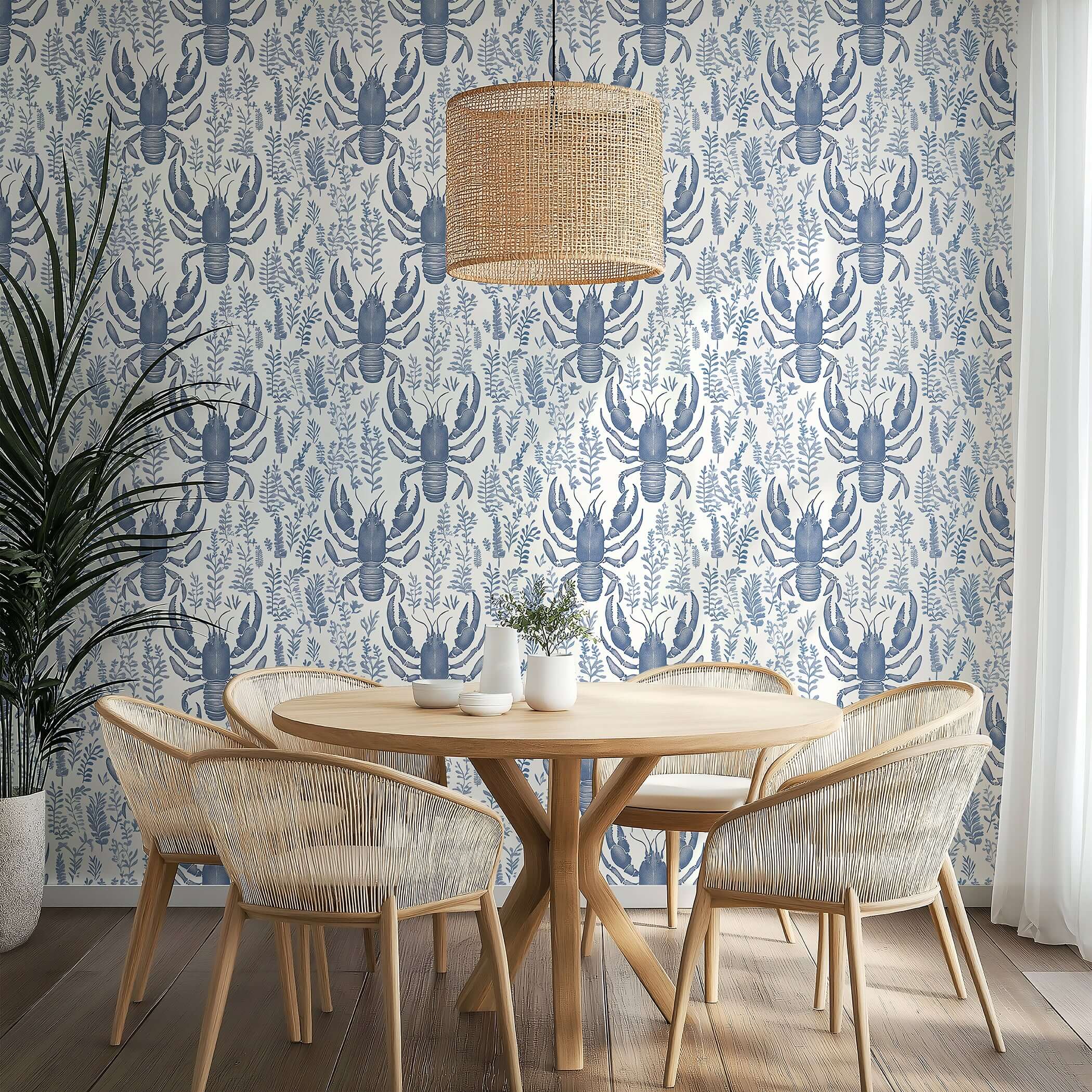 Lobster Bay wallpaper featuring navy lobsters and botanical motifs on an ivory background, enhancing a coastal dining room's marine style.