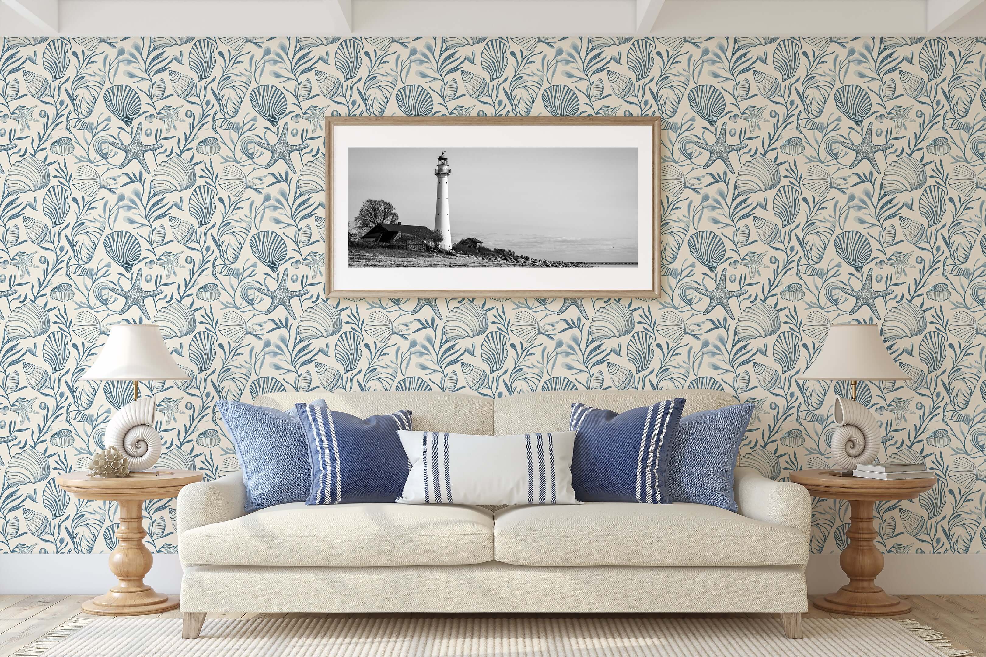 Living room with "Seashell Harmony" wallpaper featuring seashells, starfish, and sea grass in coastal blues, creating a marine theme.