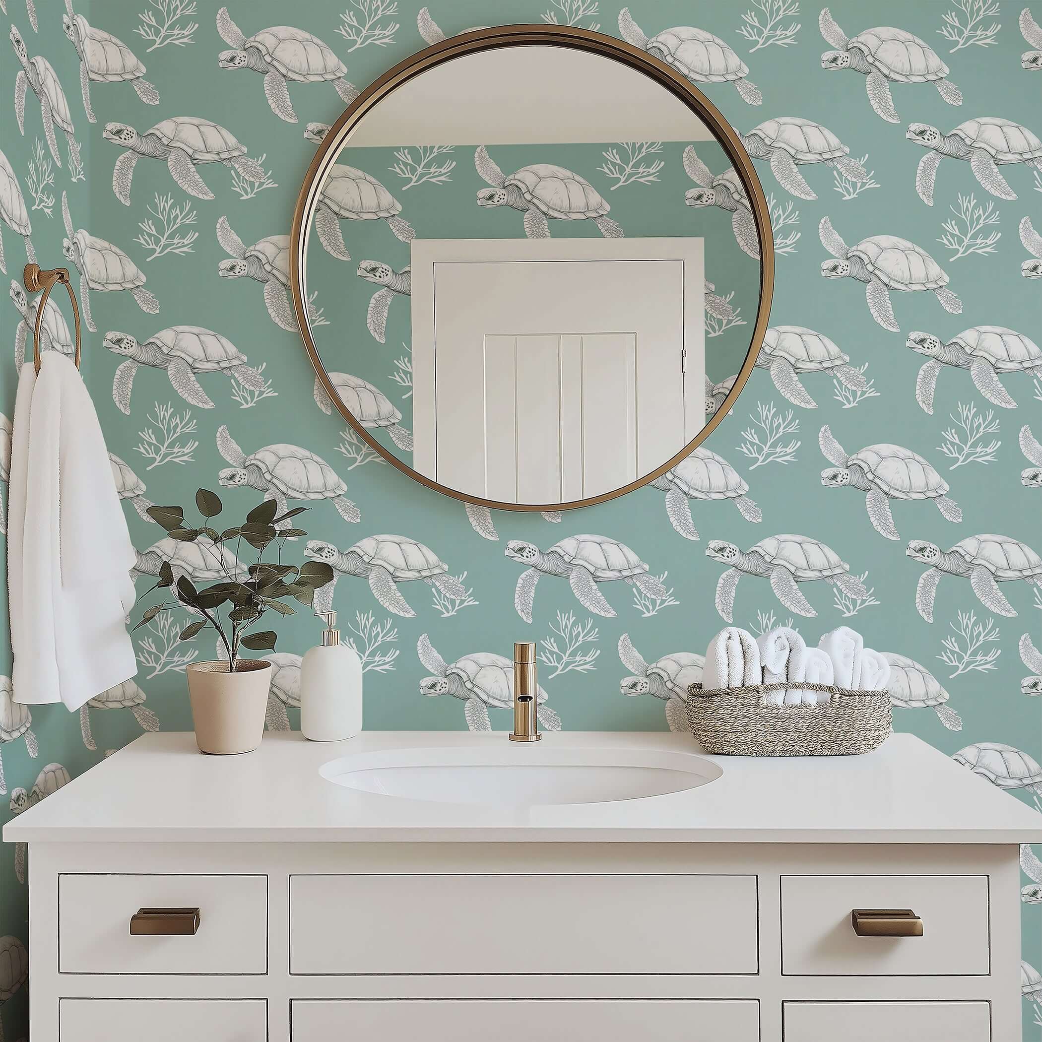 Sage green wallpaper featuring white turtles, coral, and ocean motifs, creating a coastal vibe in a modern bathroom setting.