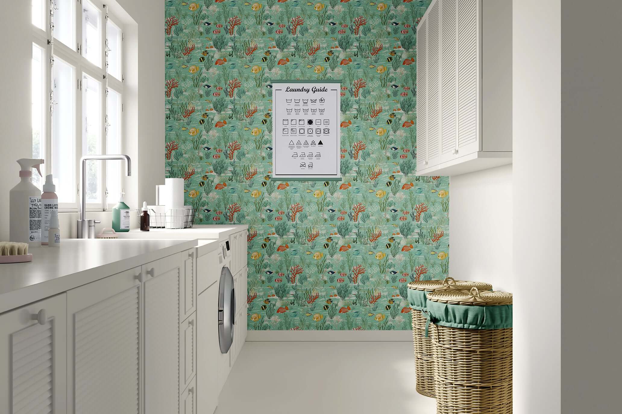 Coastal laundry room with ocean-themed "Serene Fish Garden" wallpaper featuring fish, coral, and seaweed on a seafoam green background.