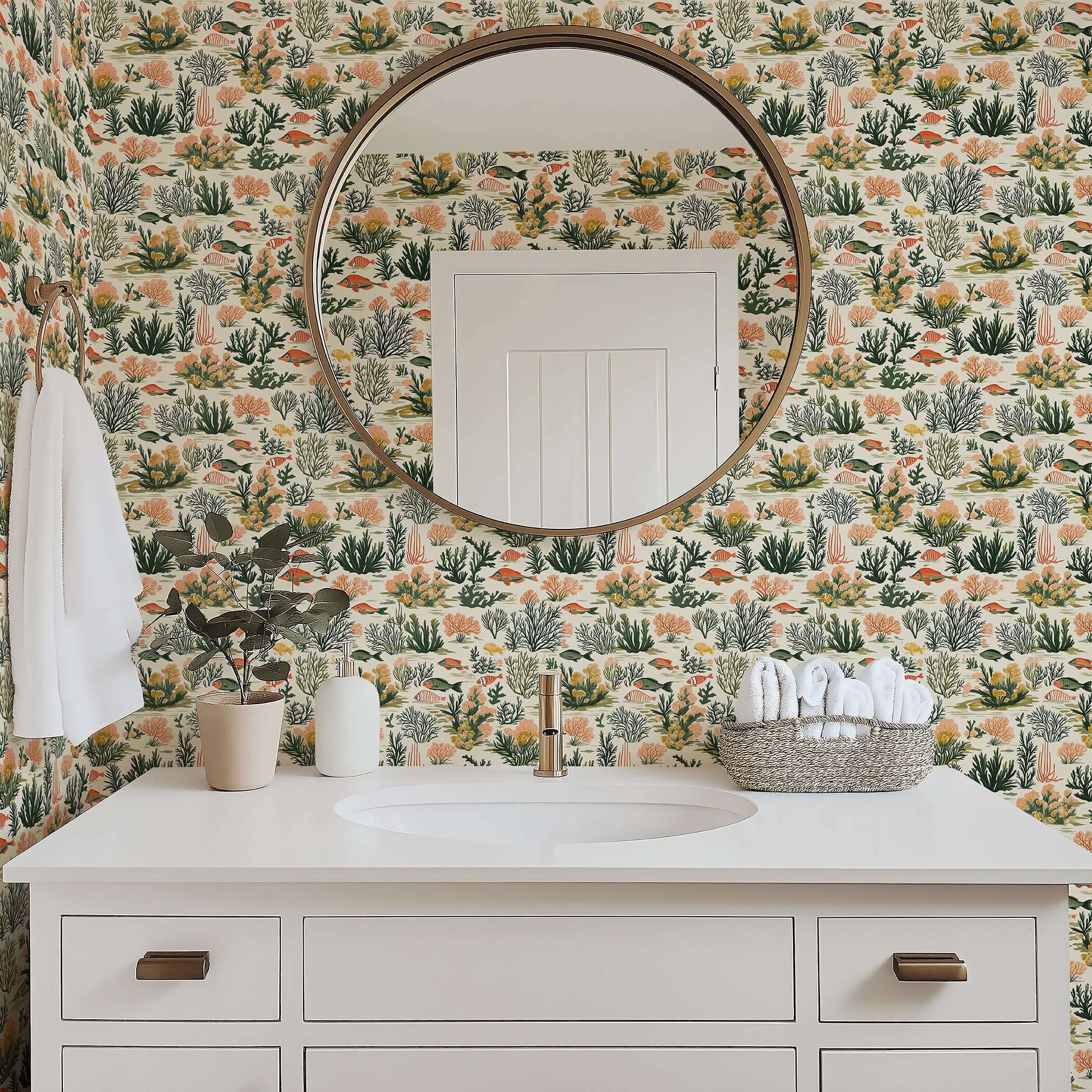 Modern bathroom with Tropical Tide coastal wallpaper featuring coral reefs, tropical fish, and sea plants in soothing greens and corals.