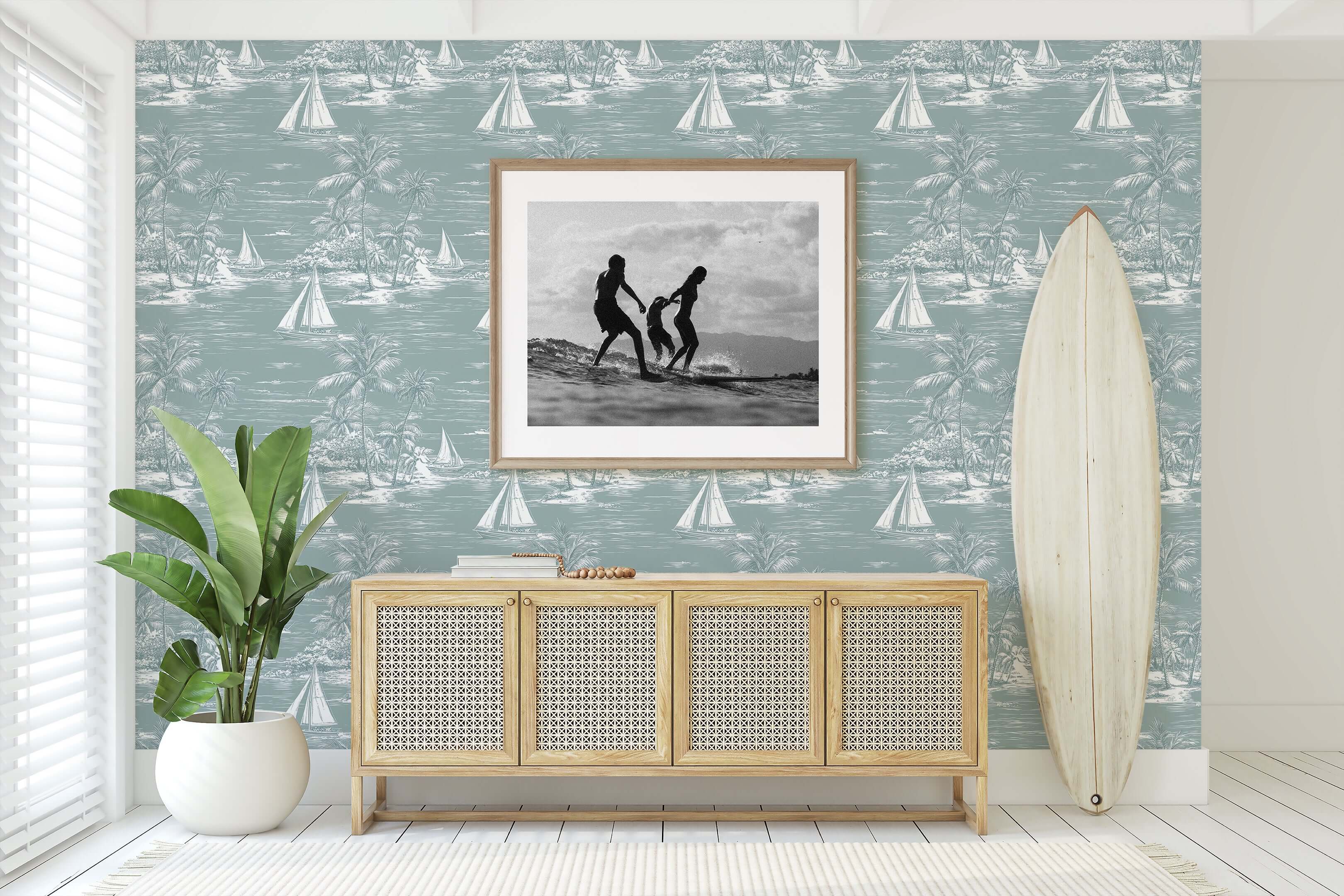 Coastal room with Lagoon Views wallpaper depicting sailboats and palm trees, enhancing the serene seaside aesthetic with boating elements.