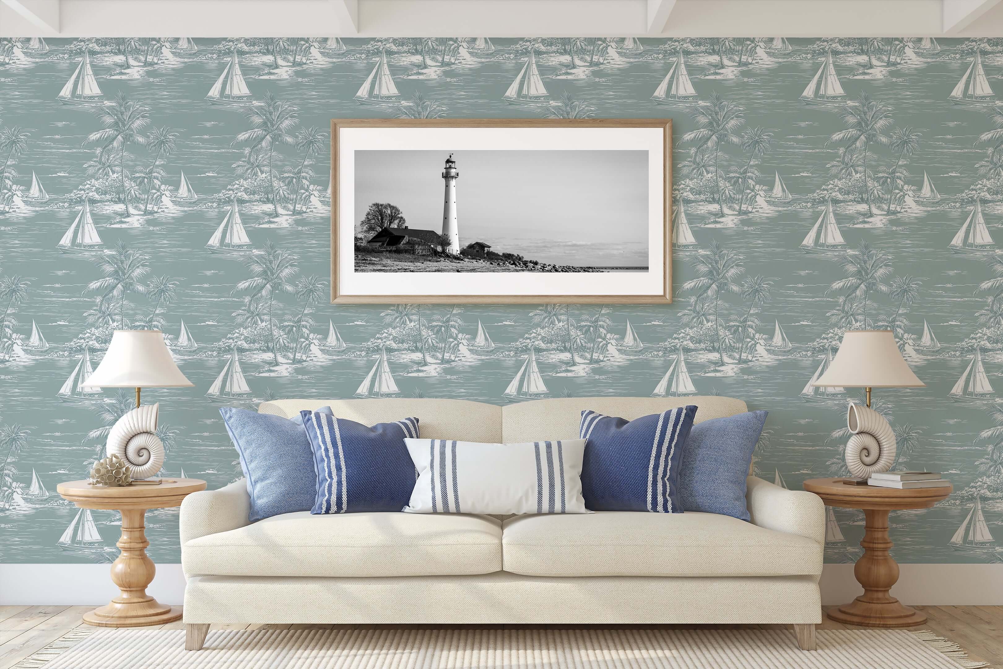 Coastal themed living room with Lagoon Views wallpaper featuring boats, palm trees, and ocean, creating a serene harbor ambiance.