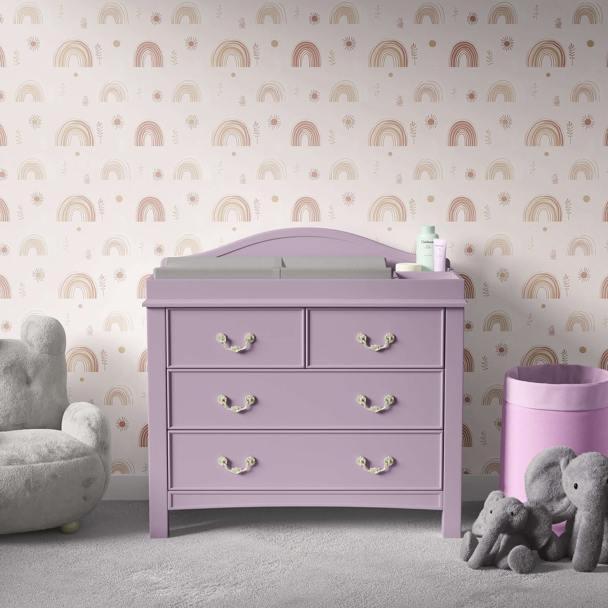Cozy nursery with Sunshine and Rainbows II wallpaper featuring pastel rainbows, suns, and foliage, perfect for modern playroom design.