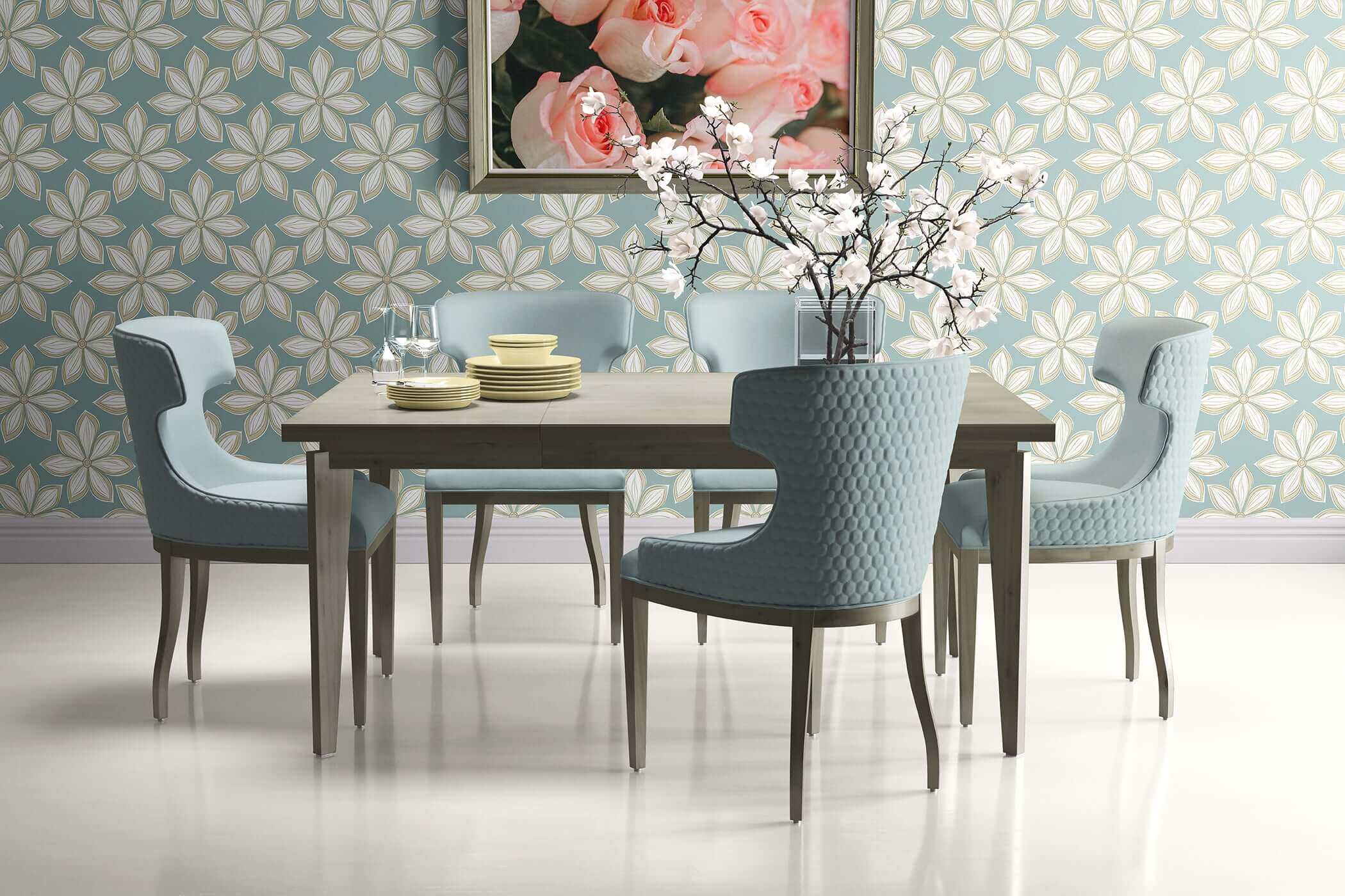 Dining room with teal mid-century modern wallpaper featuring white flowers, accented by blue chairs and a wooden table.