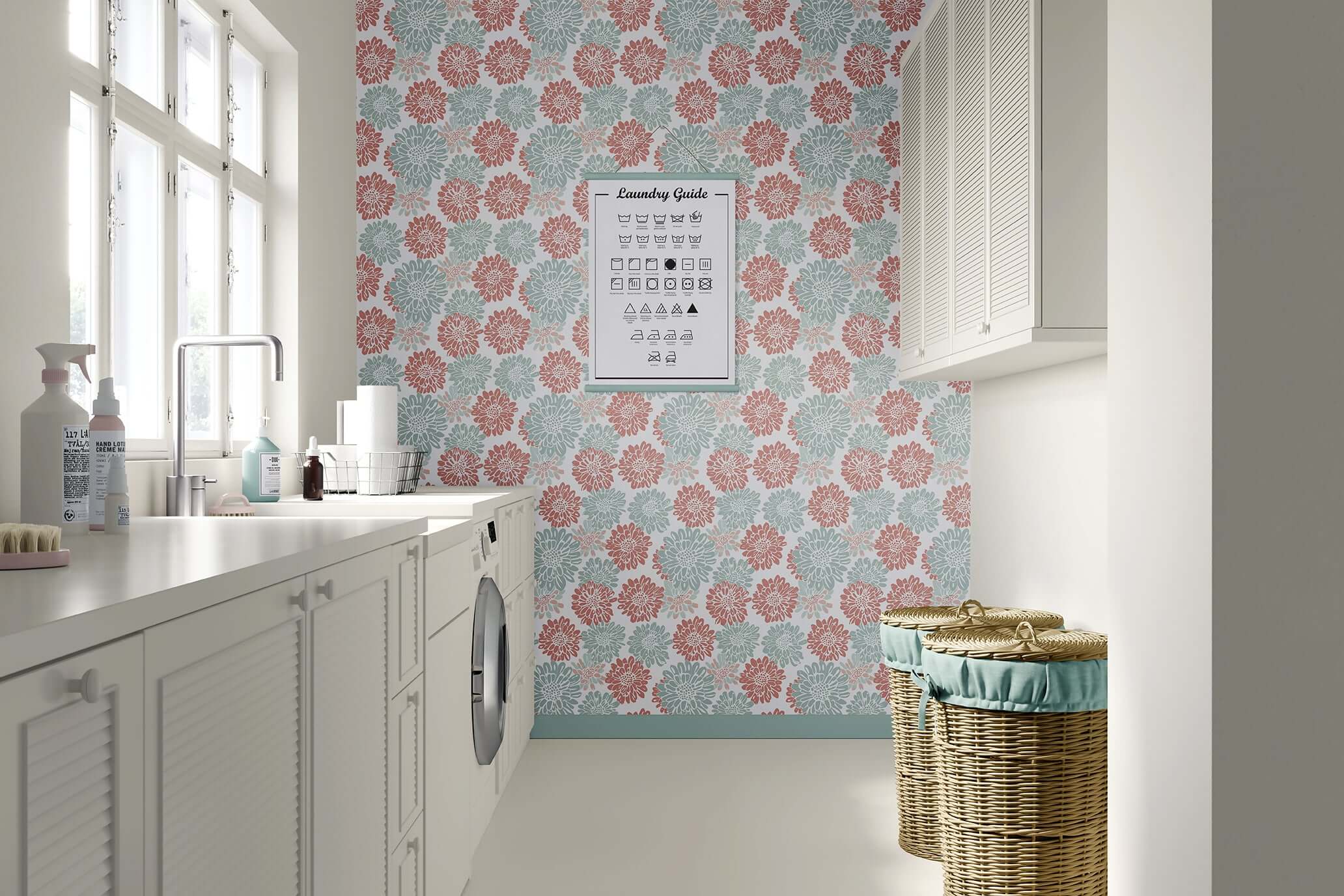 Laundry room with Playful Dahlia Parade wallpaper featuring coral pink and mint green dahlia flowers on a white background.
