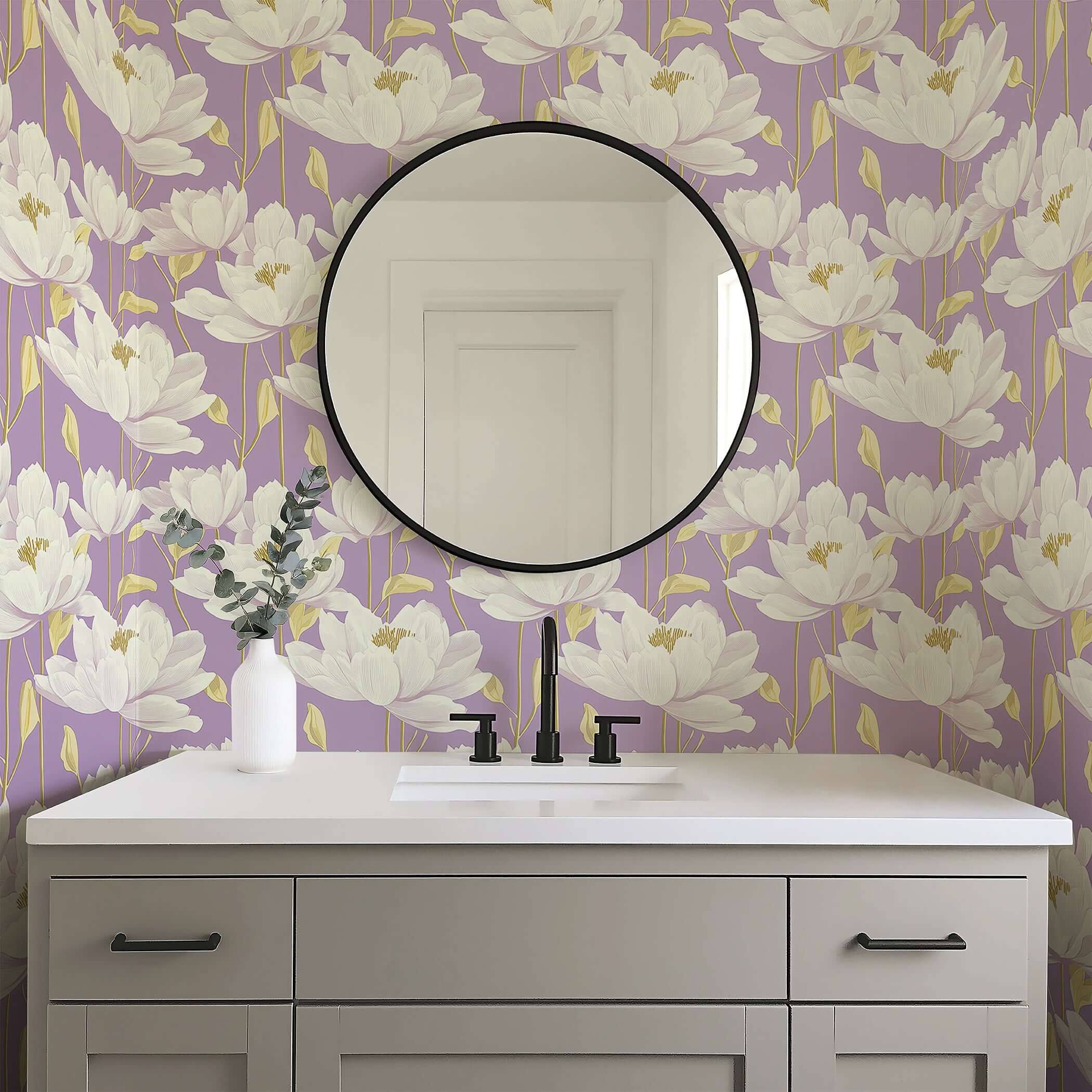 Contemporary lavender wallpaper with white florals and gold accents in a bathroom setting, featuring a round mirror above a vanity.