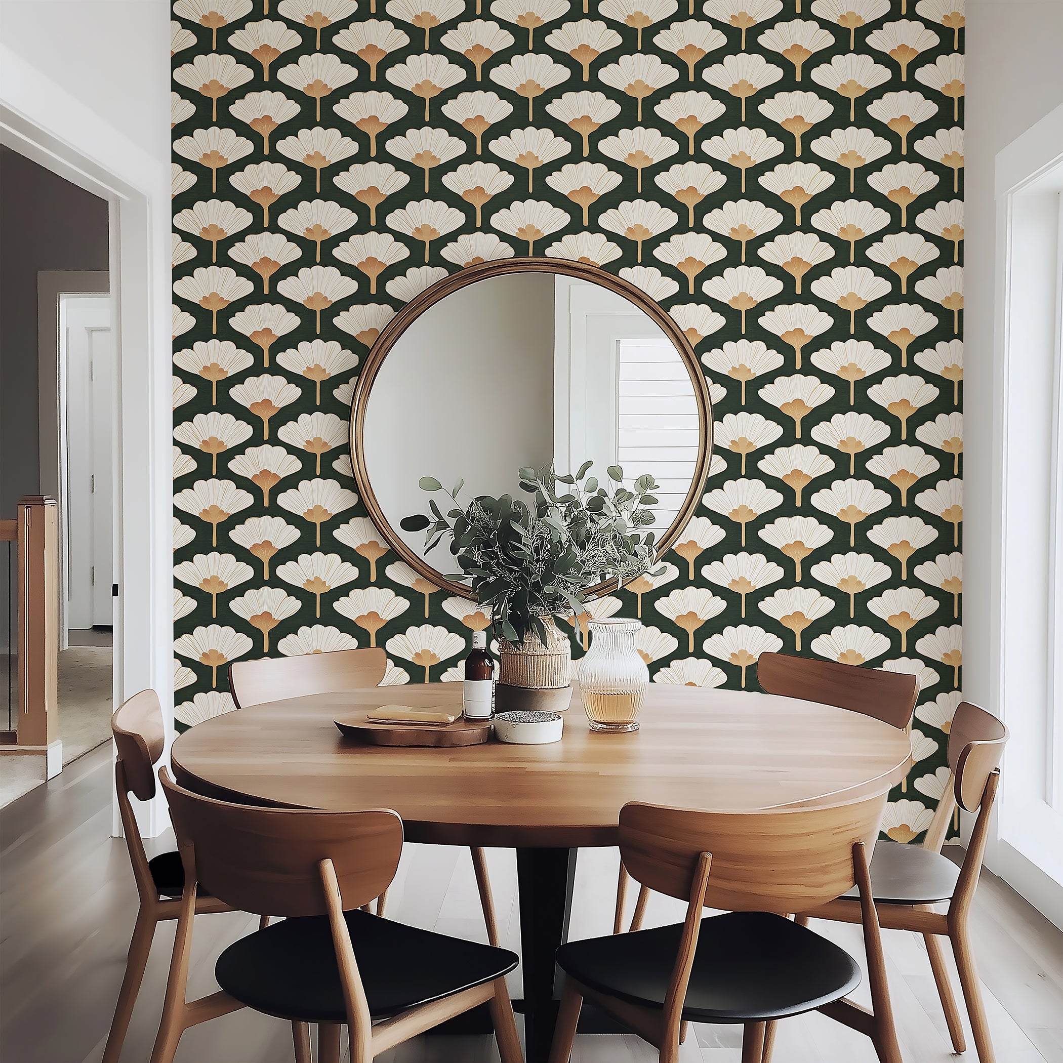 Retro Chic Ginkgo Leaf Wallpaper in cream and gold on dark green, enhancing a modern dining area with floral art deco elegance.