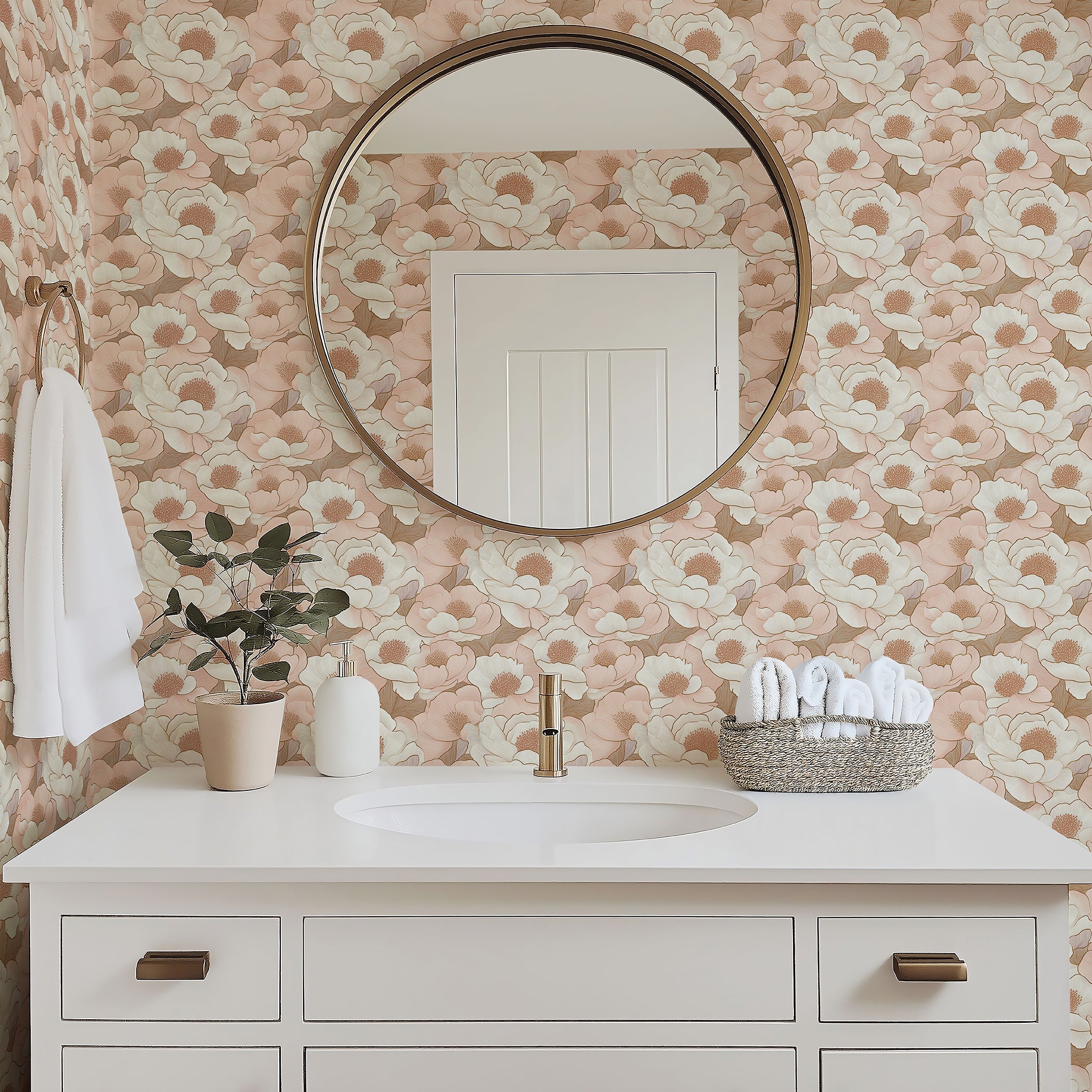 Elegant bathroom with peach floral wallpaper, featuring a round mirror, white vanity, and minimalist decor. Monochromatic floral design.