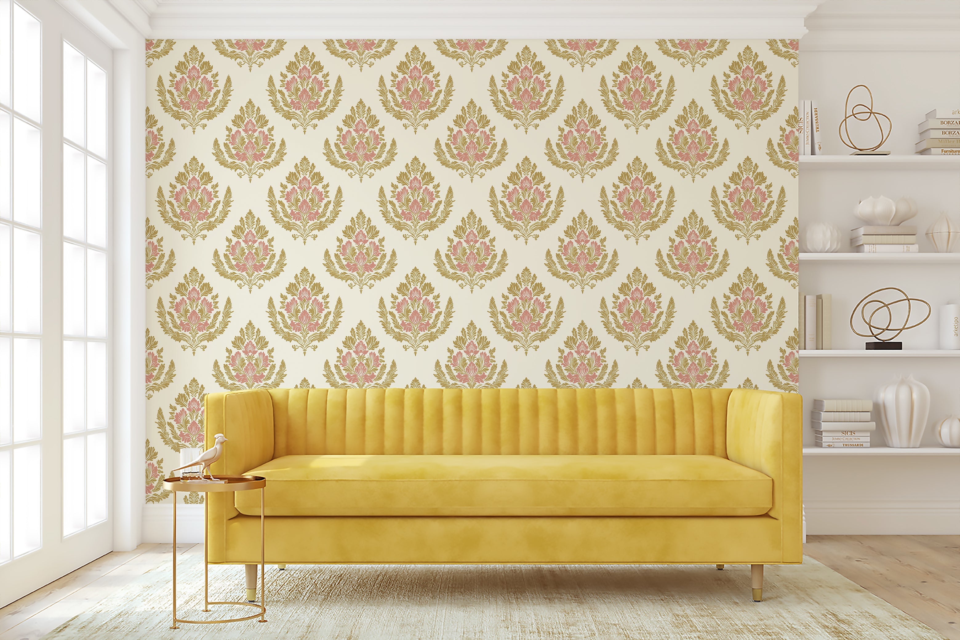 Royal Rose Crest wallpaper in floral damask design with pink and gold tones, complementing a luxury yellow sofa in a traditional-style room.