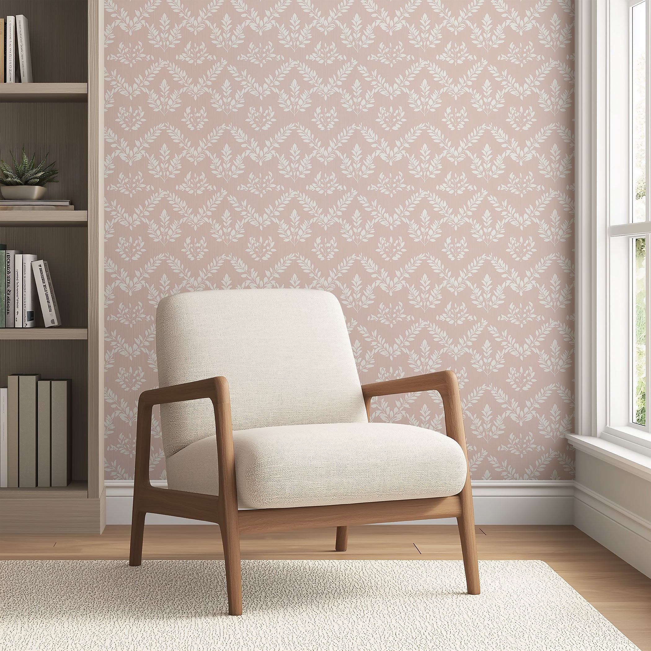 Modern room with chair and floral "Blushing Botanicals" wallpaper featuring ivory botanical silhouettes and laurel patterns on blush background.
