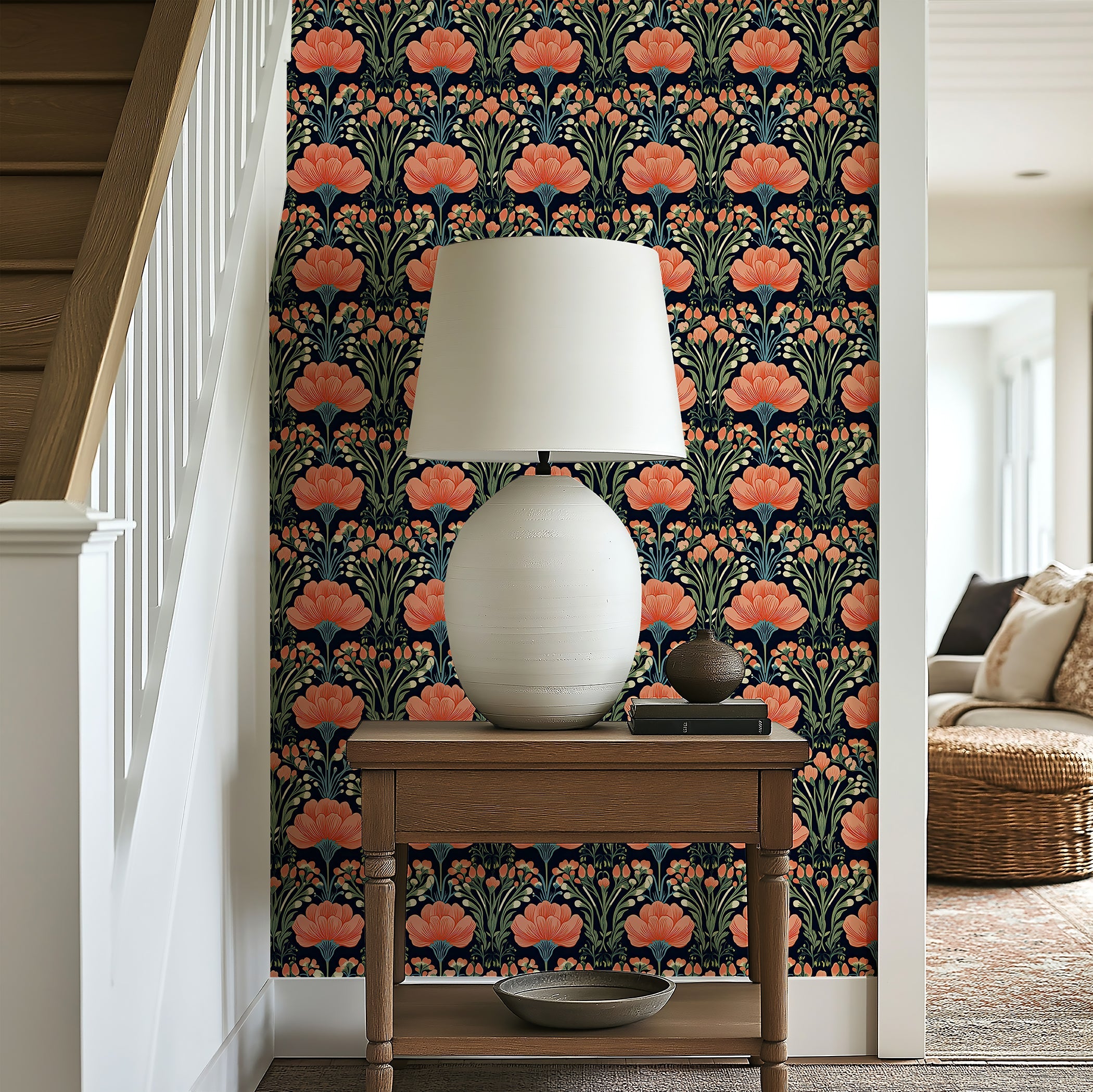 Decorative wall with Vivid Garden Bloom floral wallpaper featuring coral and salmon flowers on a black background, alongside a lamp on a wooden table.