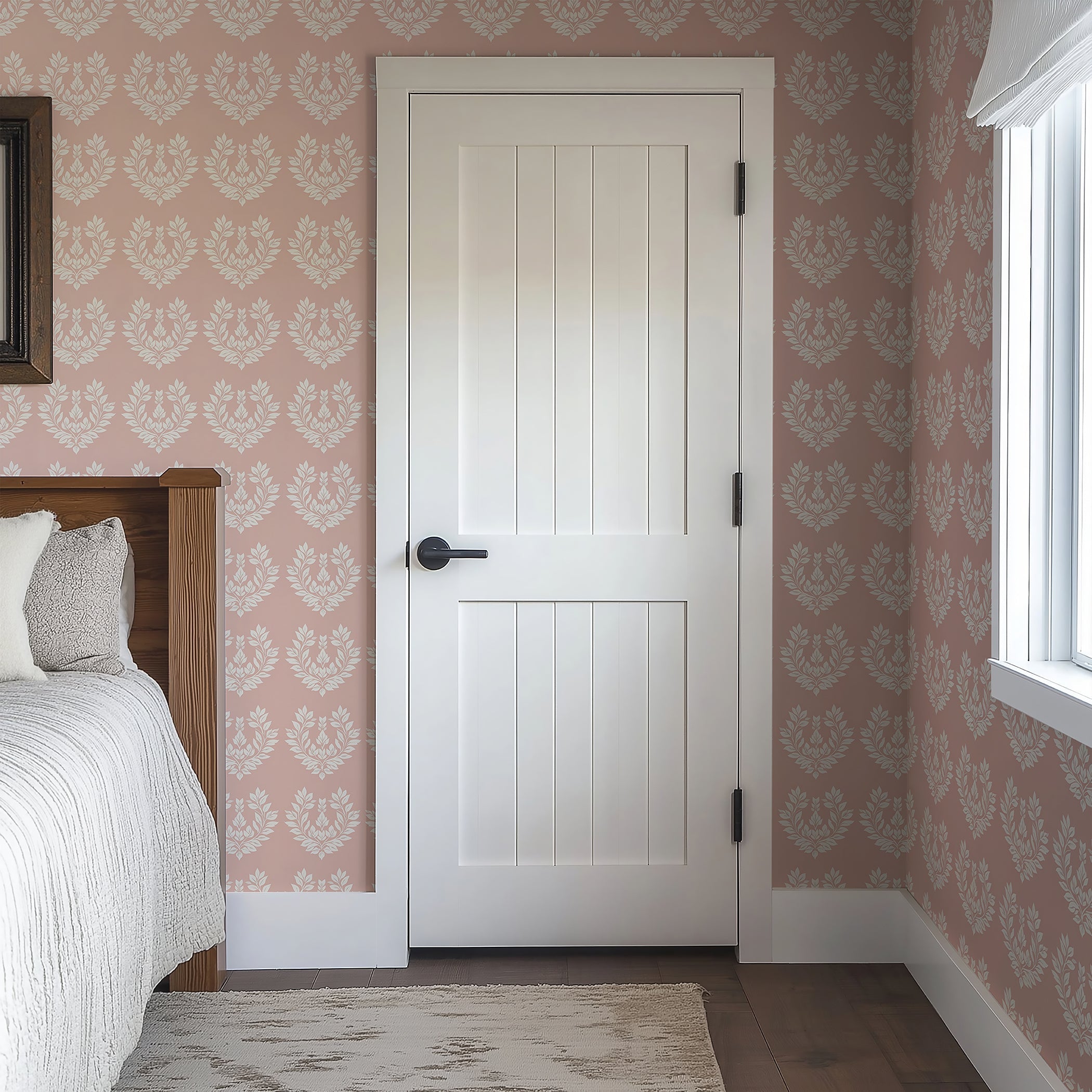 Elegant floral wallpaper with white laurels on blush-pink background, ideal for creating a romantic, traditional bedroom decor.