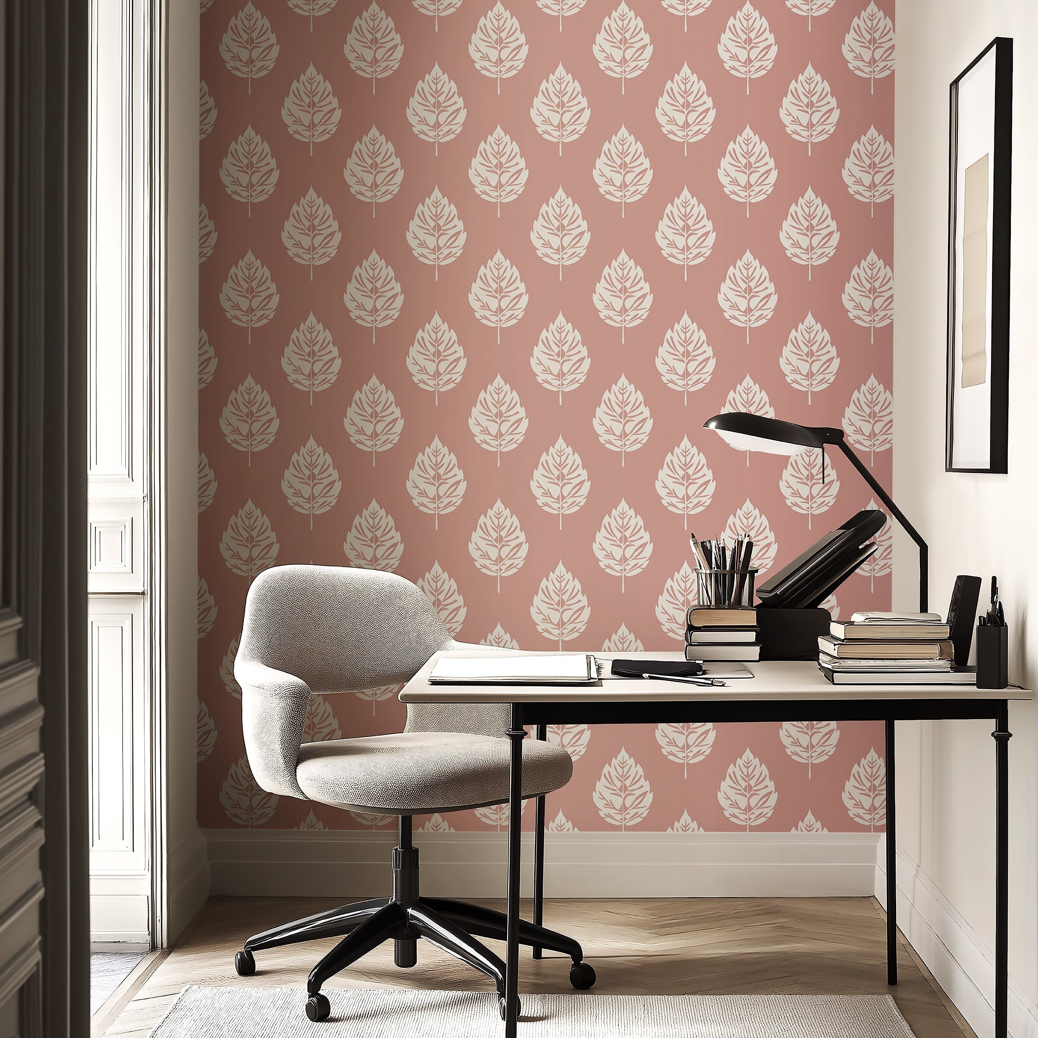 Blush Leaf Wallpaper in a home office with white leaf patterns on a pink background, creating a stylish and calming atmosphere.