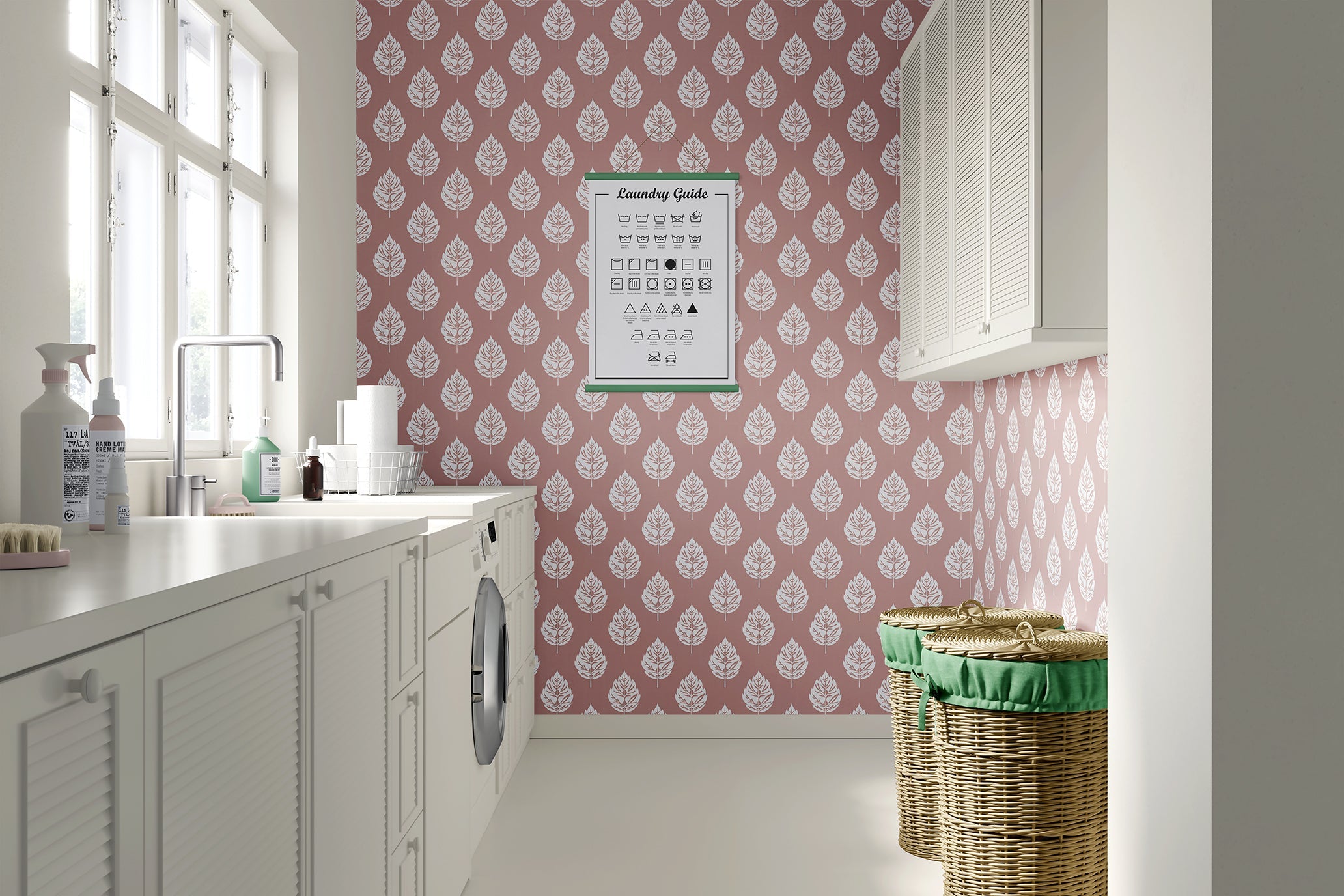 Contemporary Blush Leaf wallpaper in a laundry room, featuring white leaves on a muted pink background.
