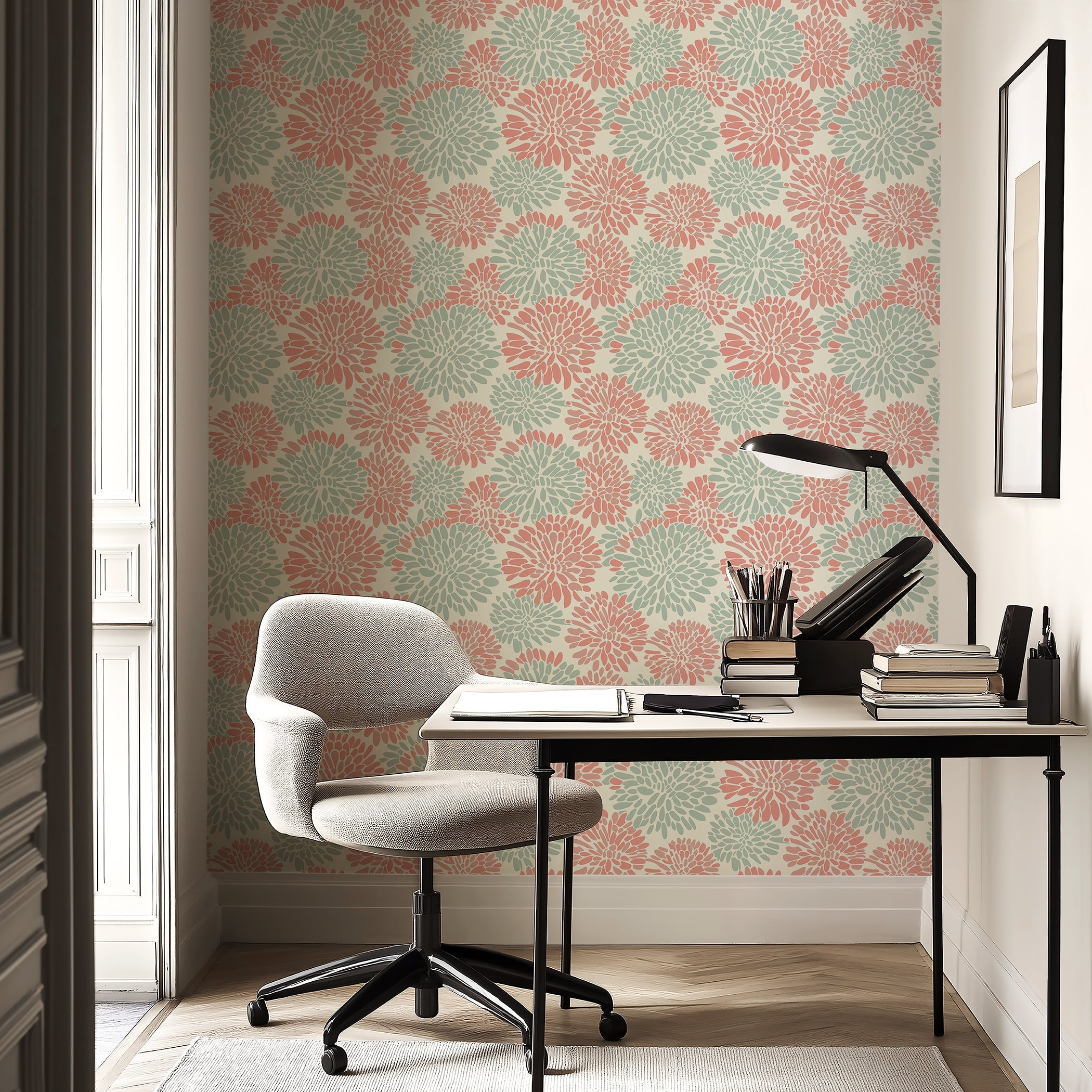 Dahlia Dance wallpaper featuring coral and mint green floral bursts in a modern workspace.