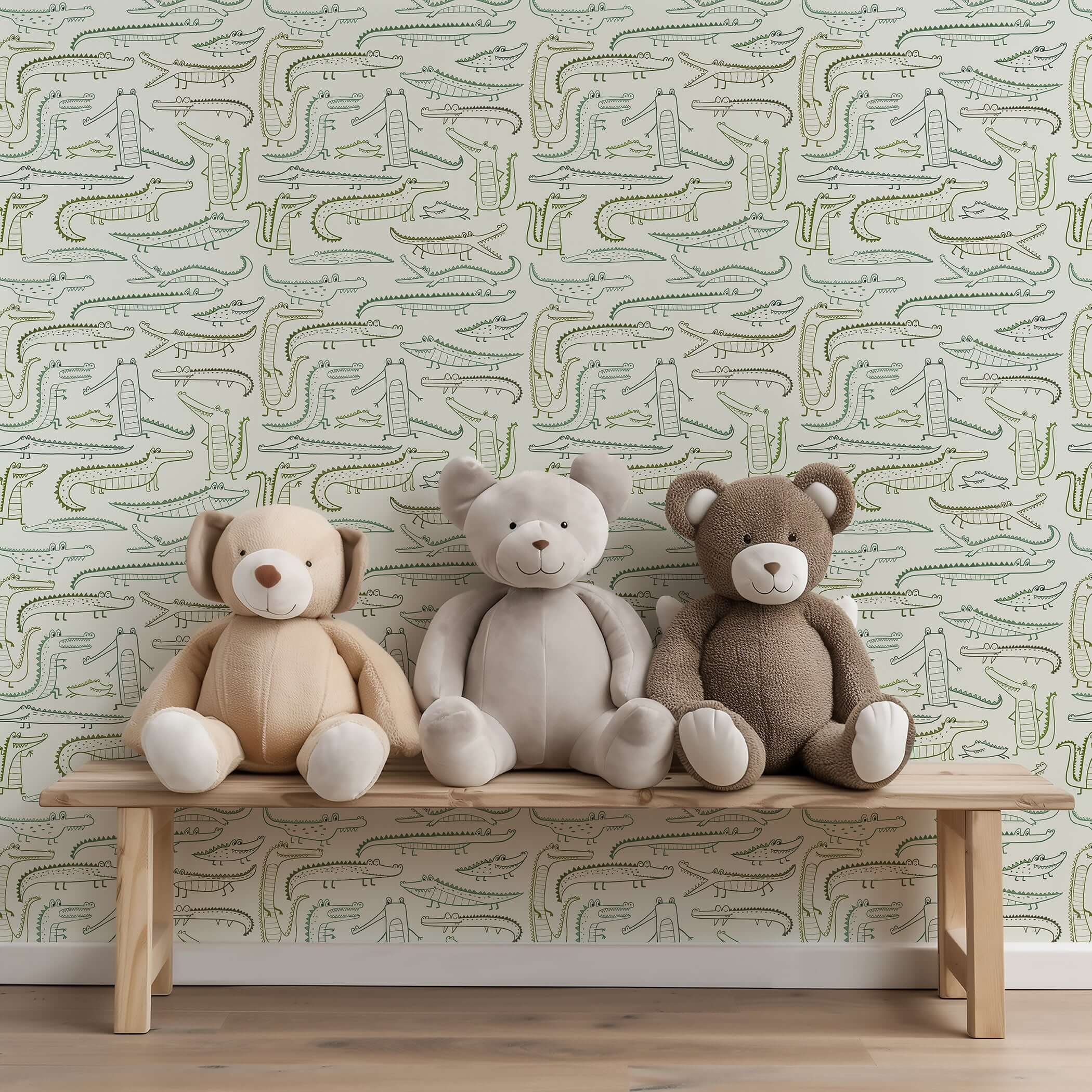 Soft green crocodile wallpaper with teddy bears on a bench in a nursery or playroom, perfect for baby and children's fun spaces.