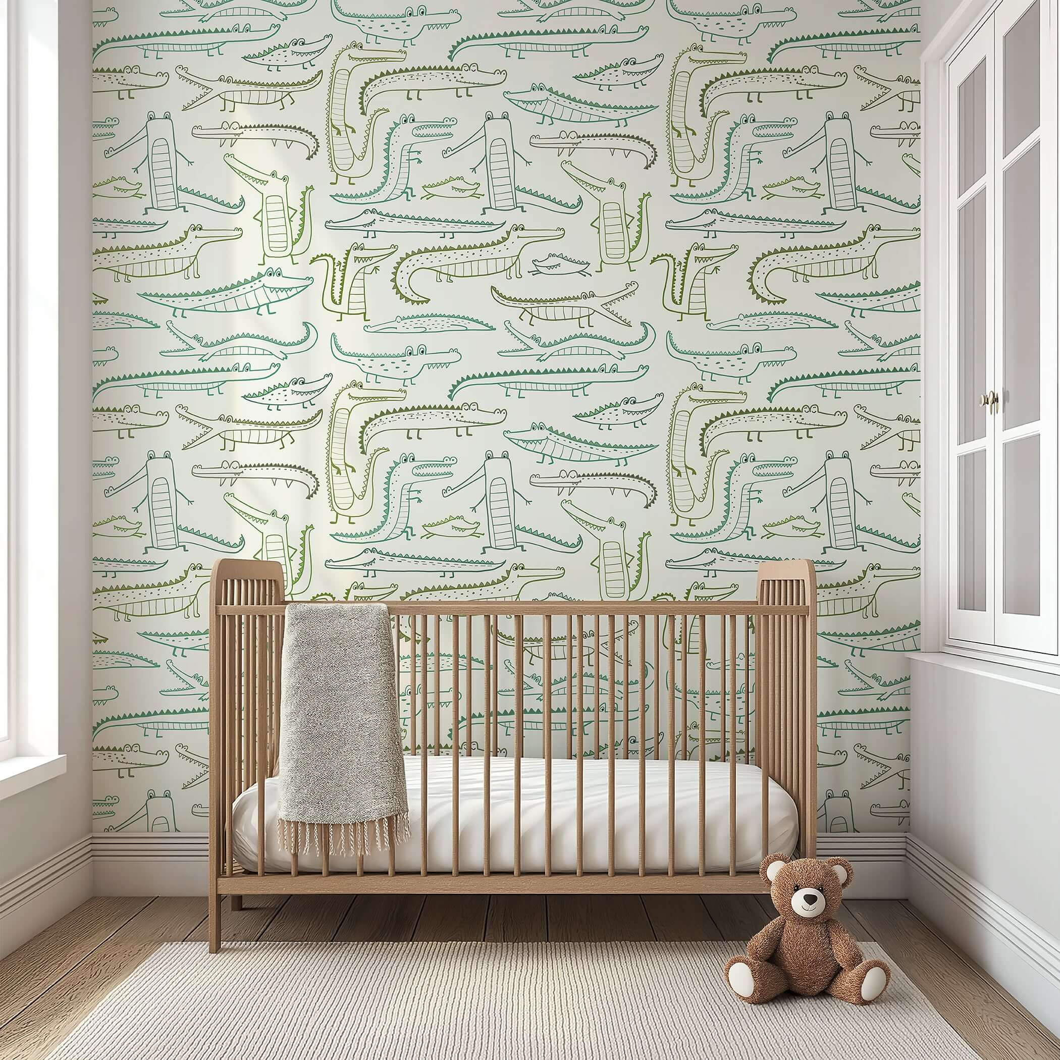 Whimsical baby nursery with crocodile wallpaper, wooden crib, and teddy bear; ideal for children's playroom decor.