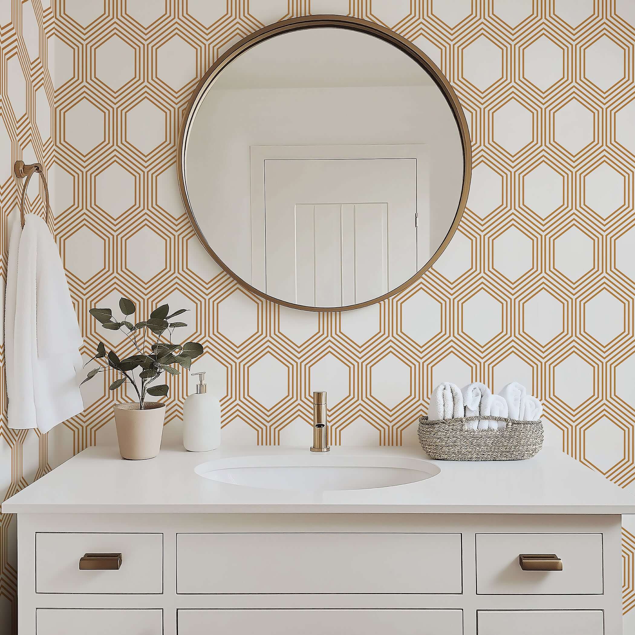 Art Deco geometric wallpaper with bronze hexagons on white in a modern bathroom setting.