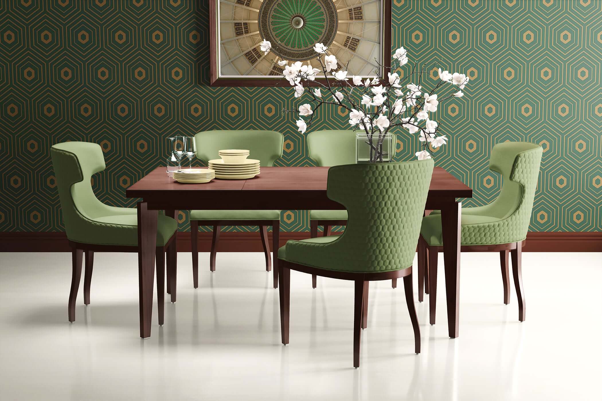 Art Deco dining room with geometric wallpaper, featuring emerald and gold hexagons, green chairs, and a wooden table.