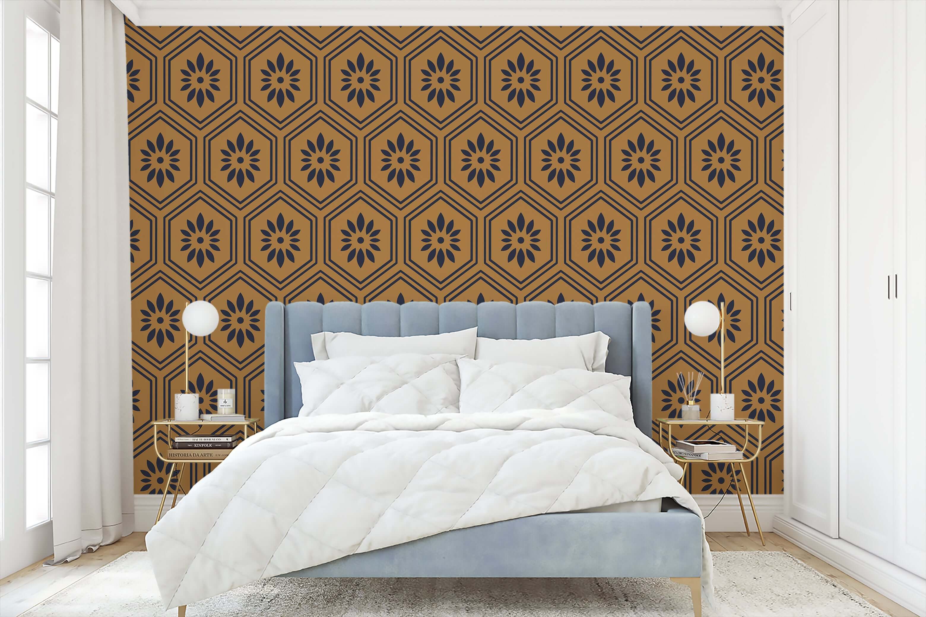 Art deco geometric modern wallpaper with black floral patterns in honeycomb hexagons on an ochre background in a bedroom setting.