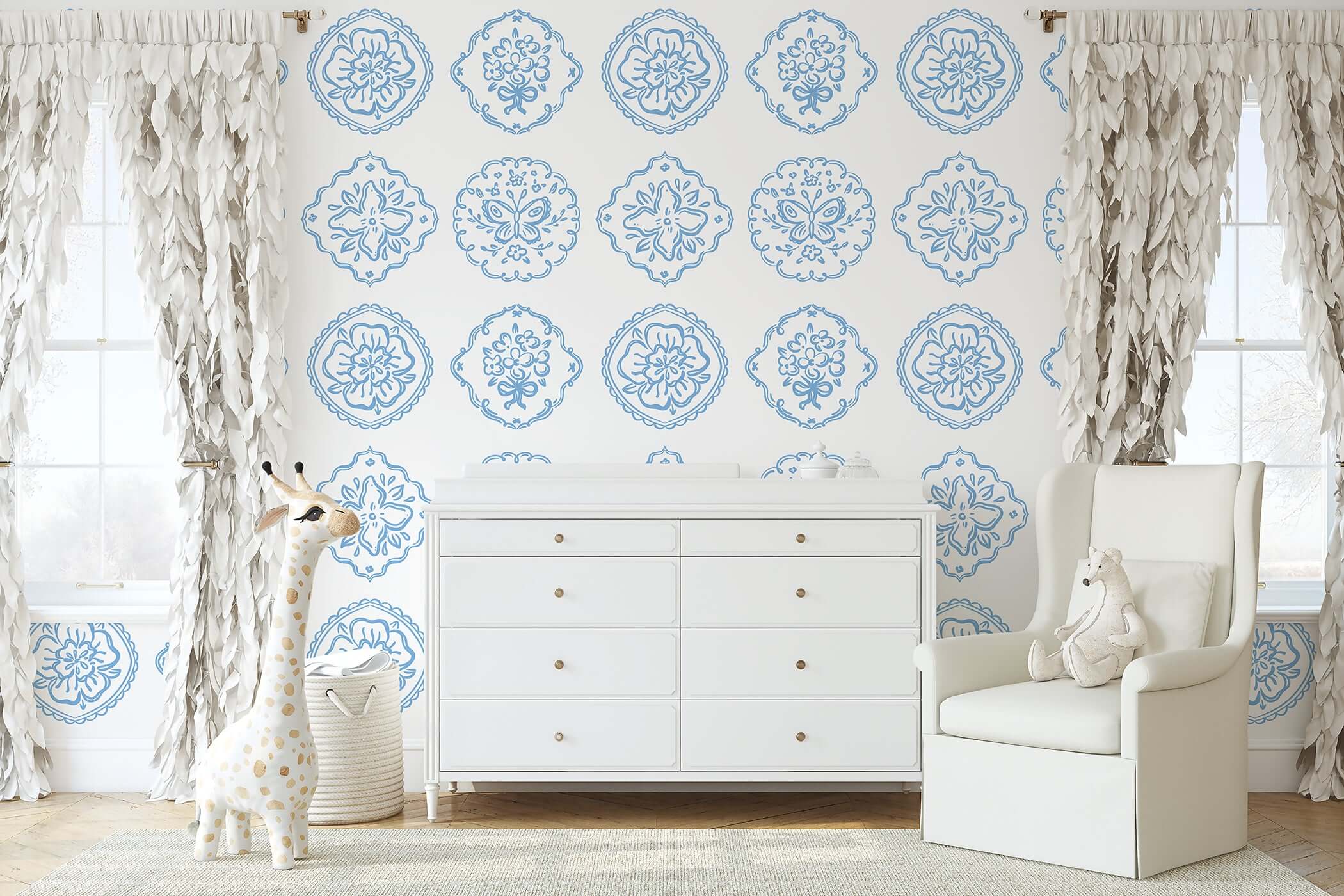 Chateau Garden wallpaper with blue floral medallions in children's nursery, creating a French vintage style with elegance and charm.