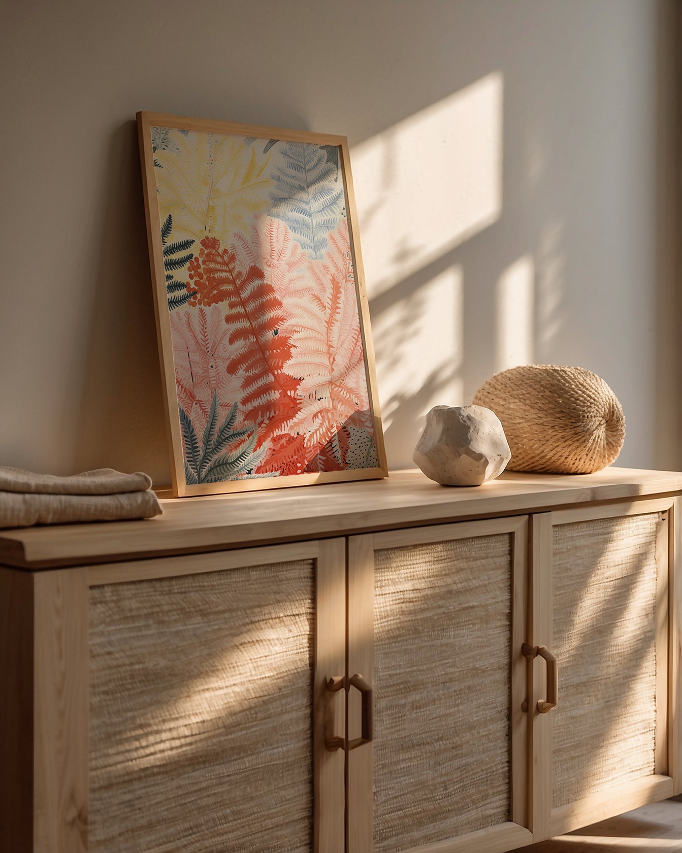 Boho Forest Radiance wall art print featuring vibrant ferns in pastel colors, displayed on a wooden console.