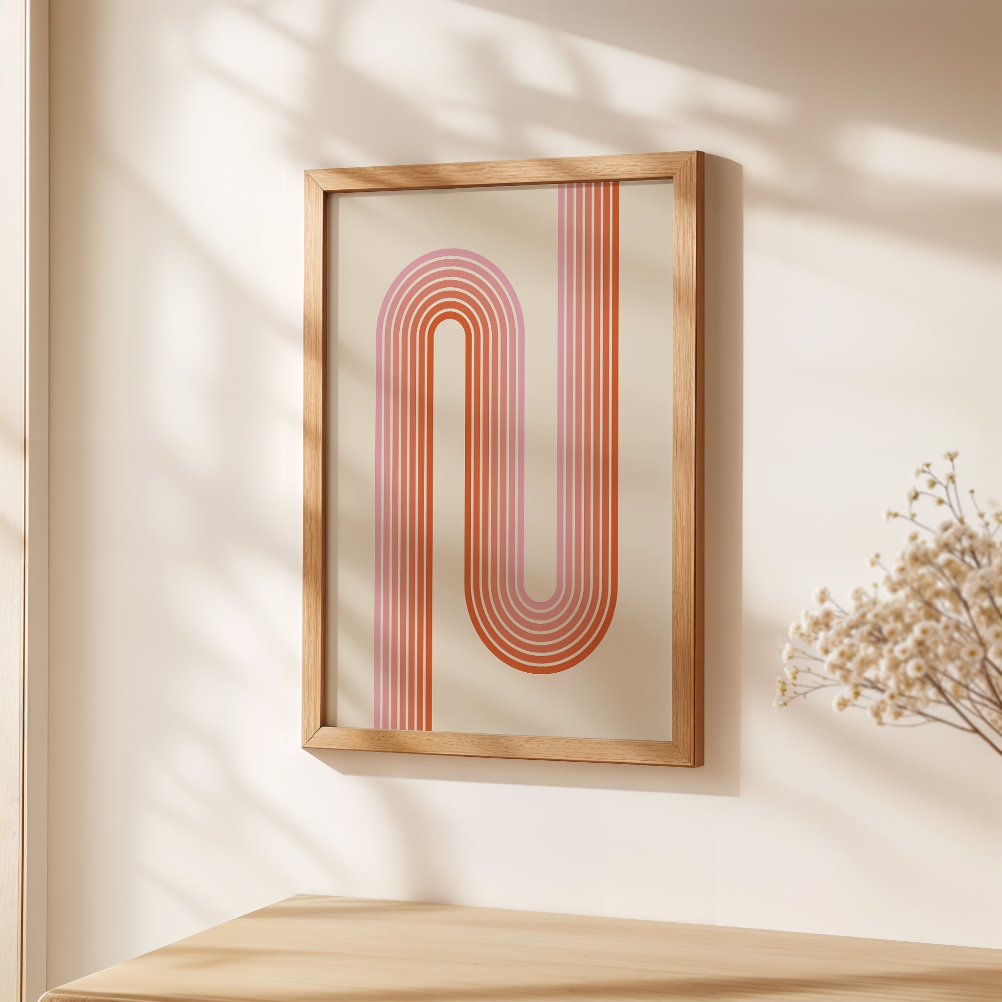 Sunset Stripes wall art print with Bauhaus design, featuring coral and blush geometric patterns in a modern frame.