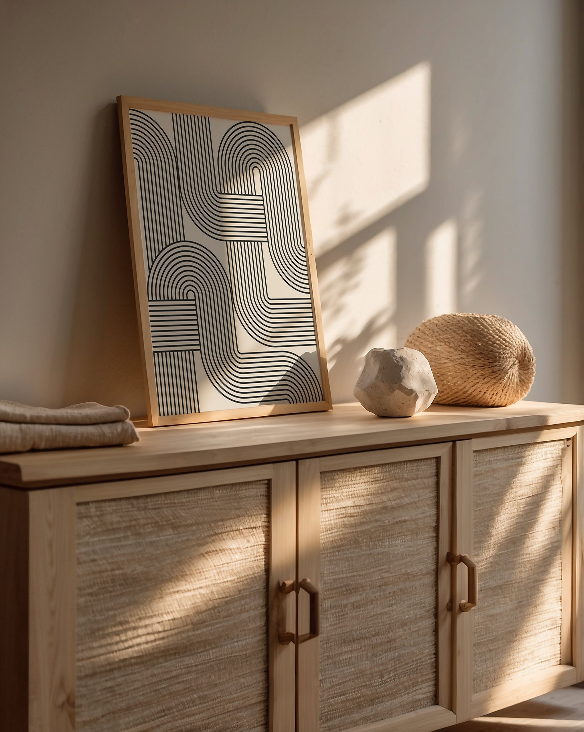 Bauhaus-inspired wall art print 'Loop Logic' framed, showcasing geometric precision in a modern home setting.