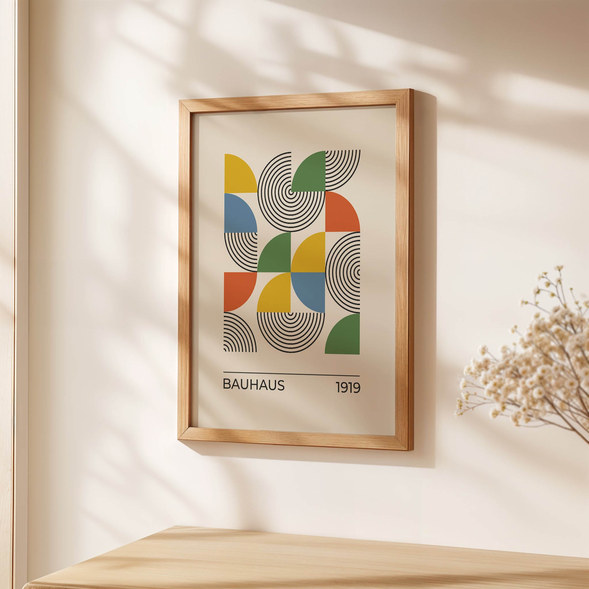 Bauhaus art print featuring geometric shapes and vibrant colors in modern design, framed on a wall.