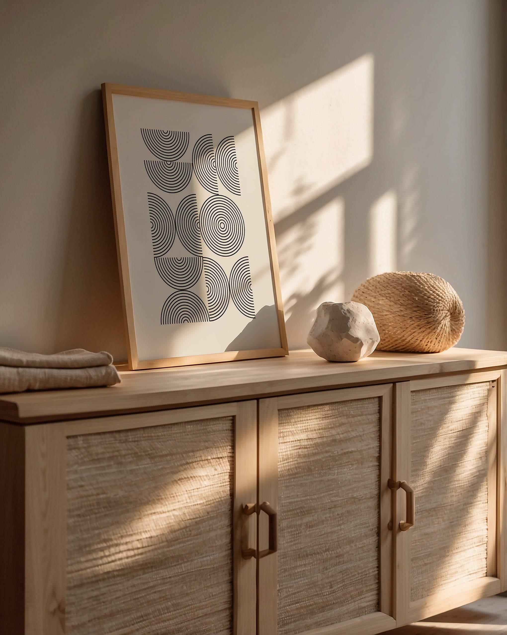 Bauhaus-inspired art print 'Structured Echoes' displayed on a wooden cabinet, enhancing minimalist home decor.