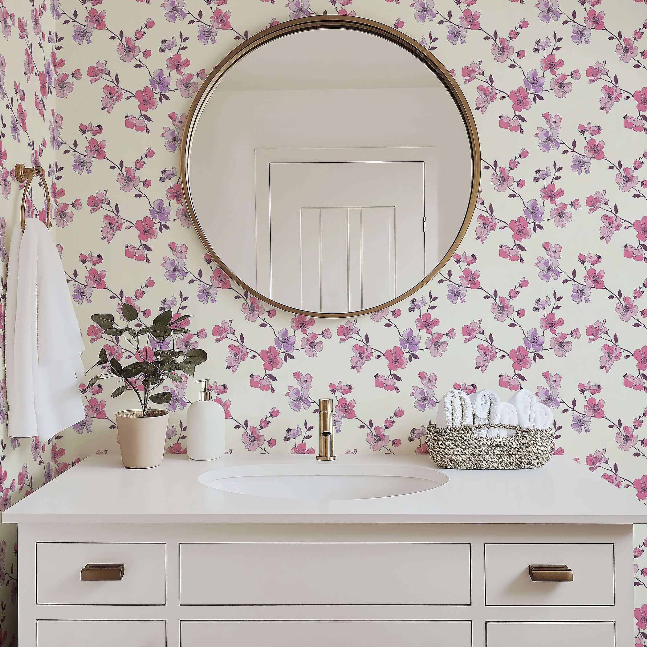 Elegant bathroom with "Botanical Blush" wallpaper featuring pink and lilac floral design, enhancing modern decor with a romantic touch.