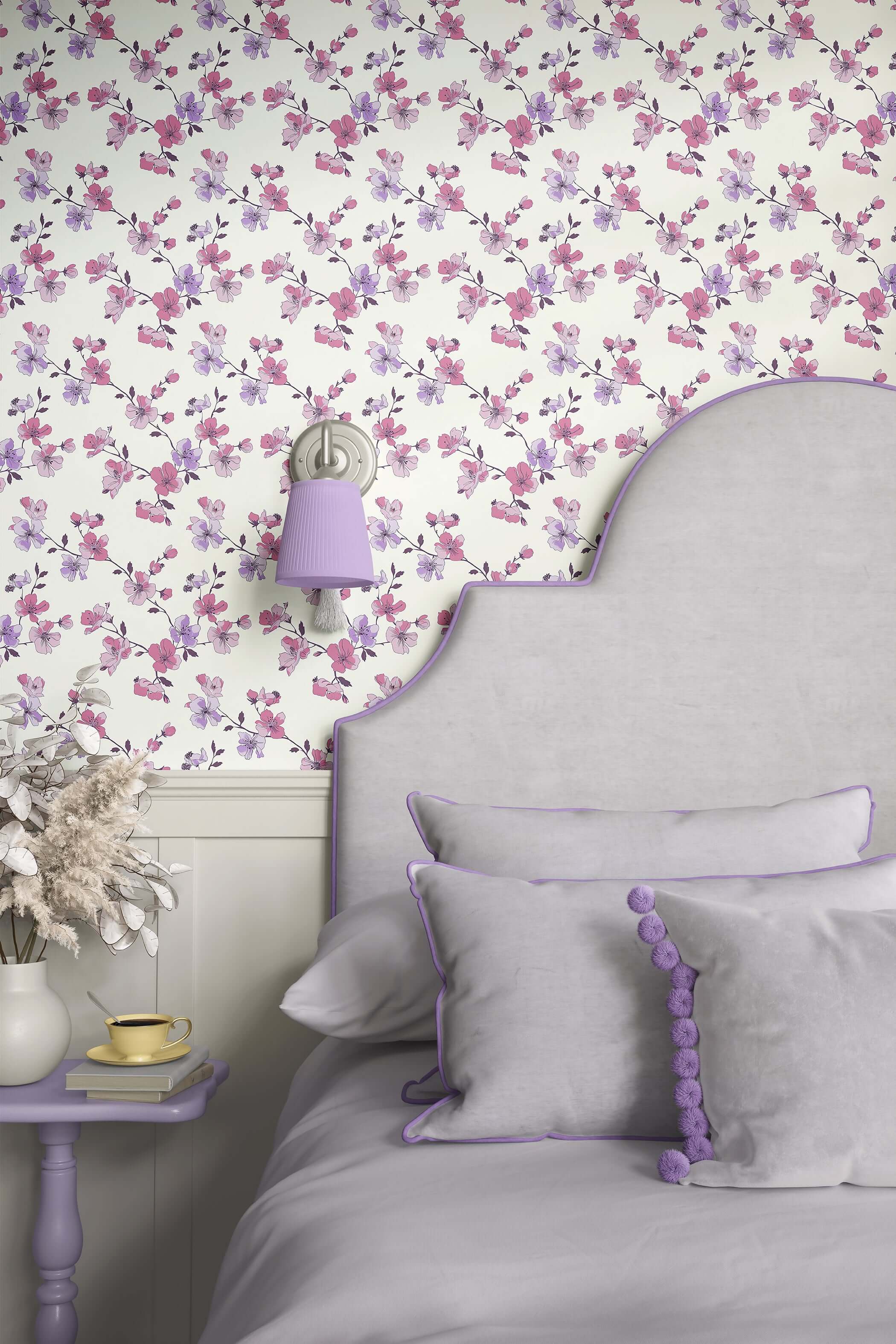 Modern botanical wallpaper featuring pink and lilac flowers, enhancing bedroom decor with elegant and contemporary style.