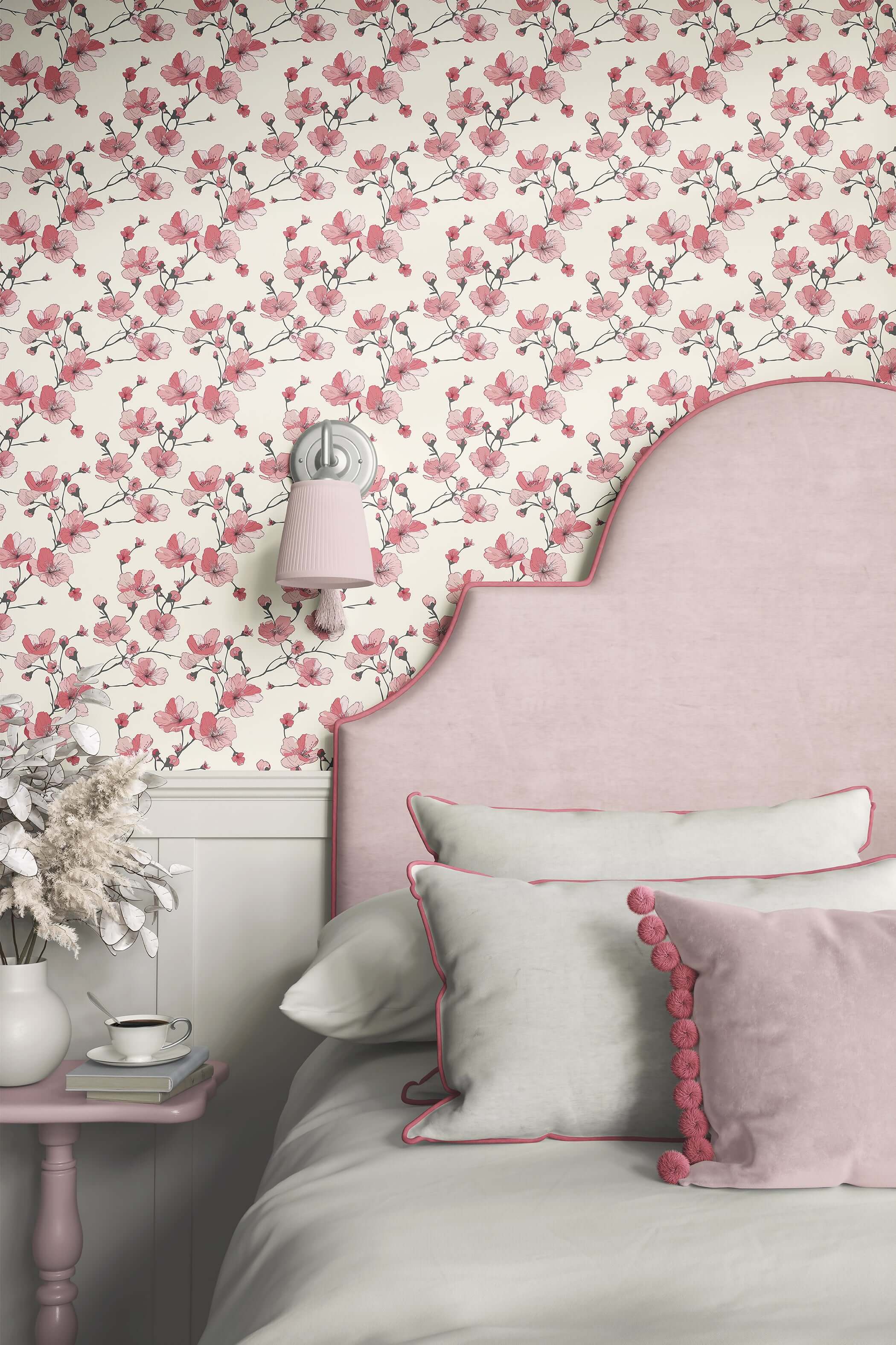 Contemporary wallpaper with pink cherry blossoms on ivory, enhancing a modern bedroom with romantic floral elegance.