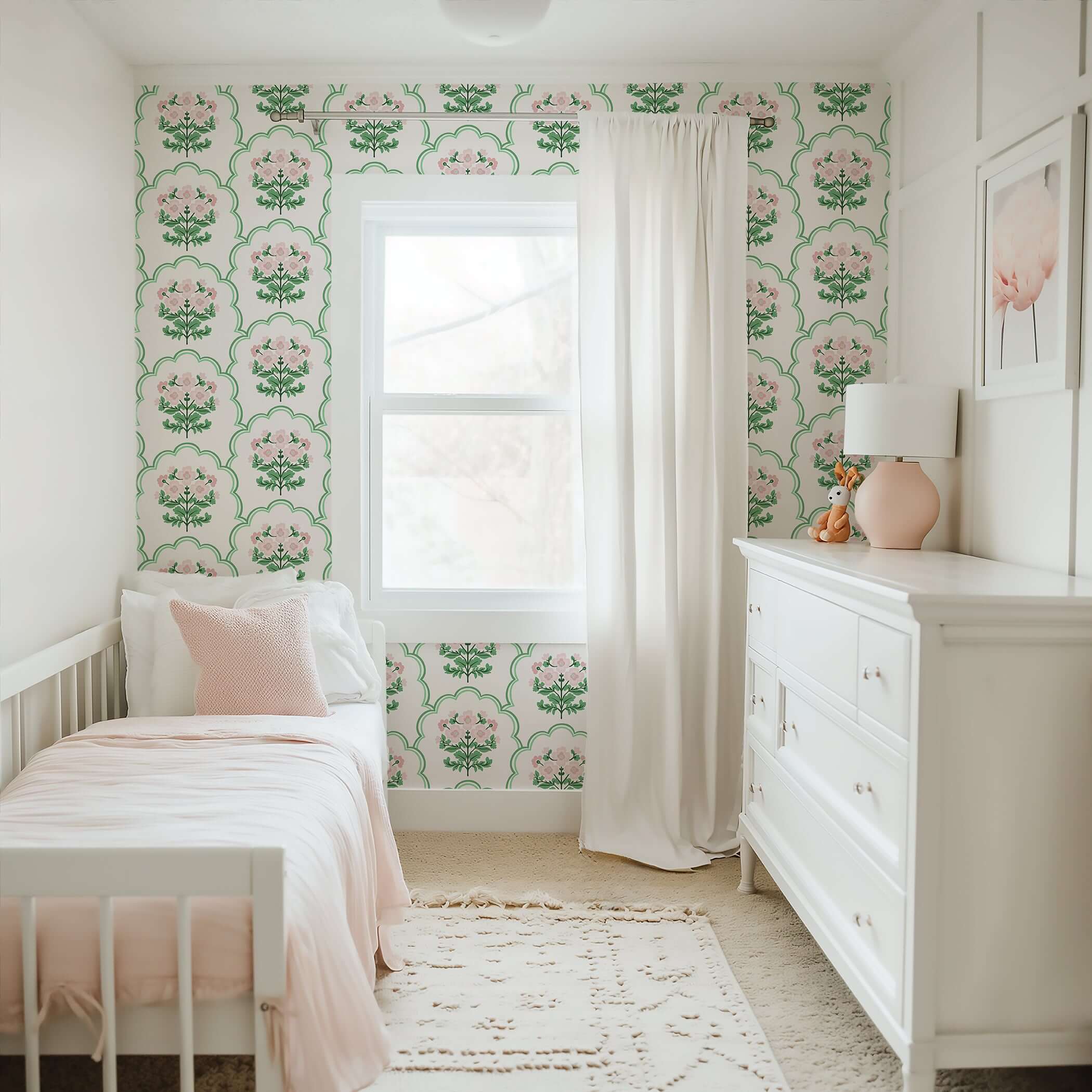 Nursery with Preppy Pink Garden Lattice floral wallpaper, featuring soft pink flowers and green lattice design for a modern, playful vibe.