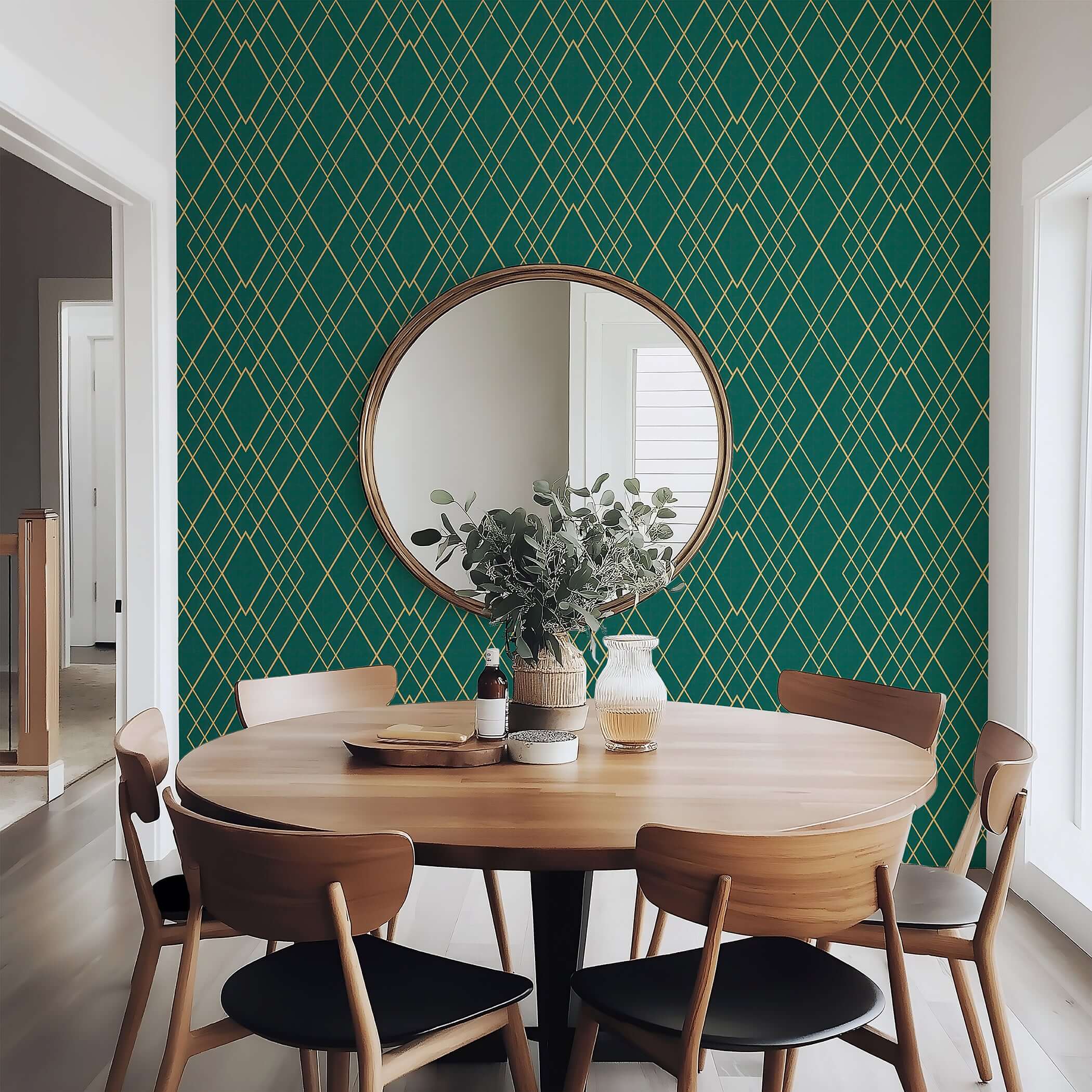 Art Deco geometric green and gold wallpaper in a dining room setting, featuring a round mirror and modern wooden furniture.