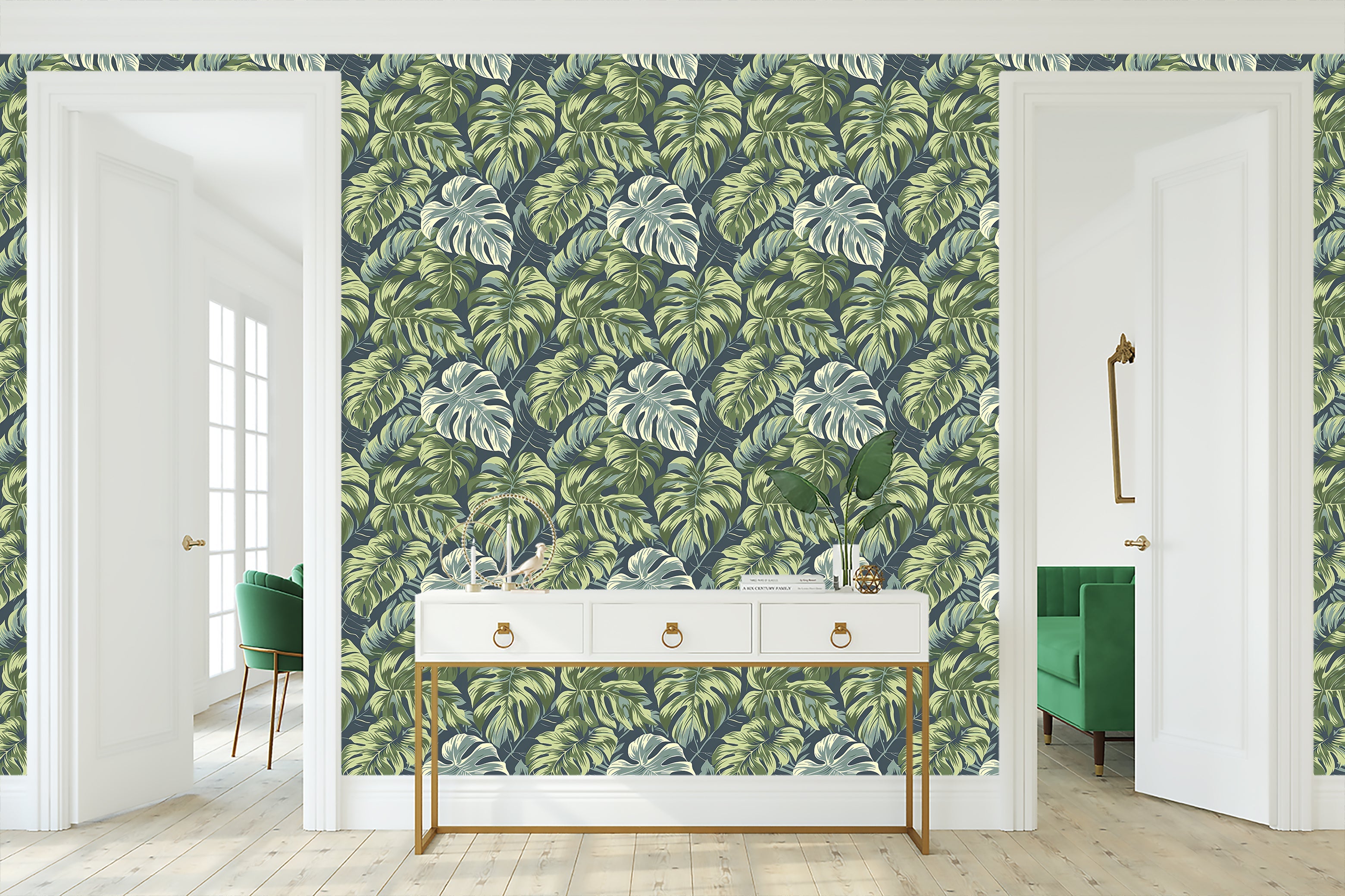 Tropical Canopy wallpaper featuring lush monstera leaves in green on a coastal background, perfect for home decor.