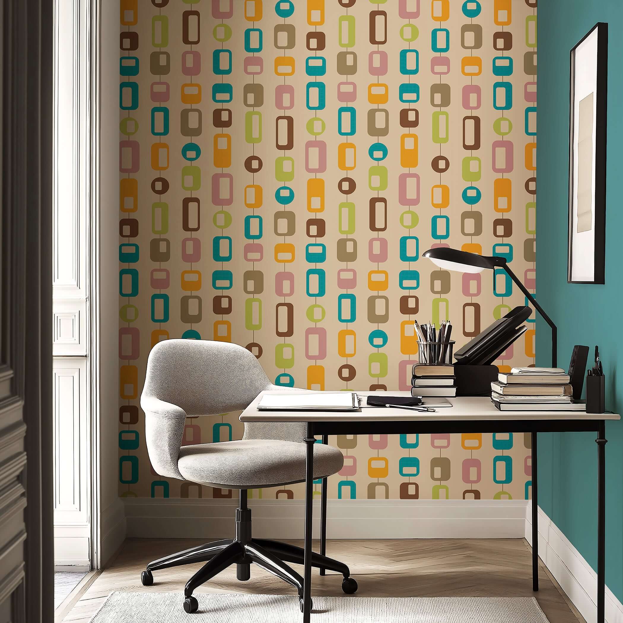 Mid-century modern geometric wallpaper in vibrant teal, orange, and pink colors creates a retro accent wall in home office.