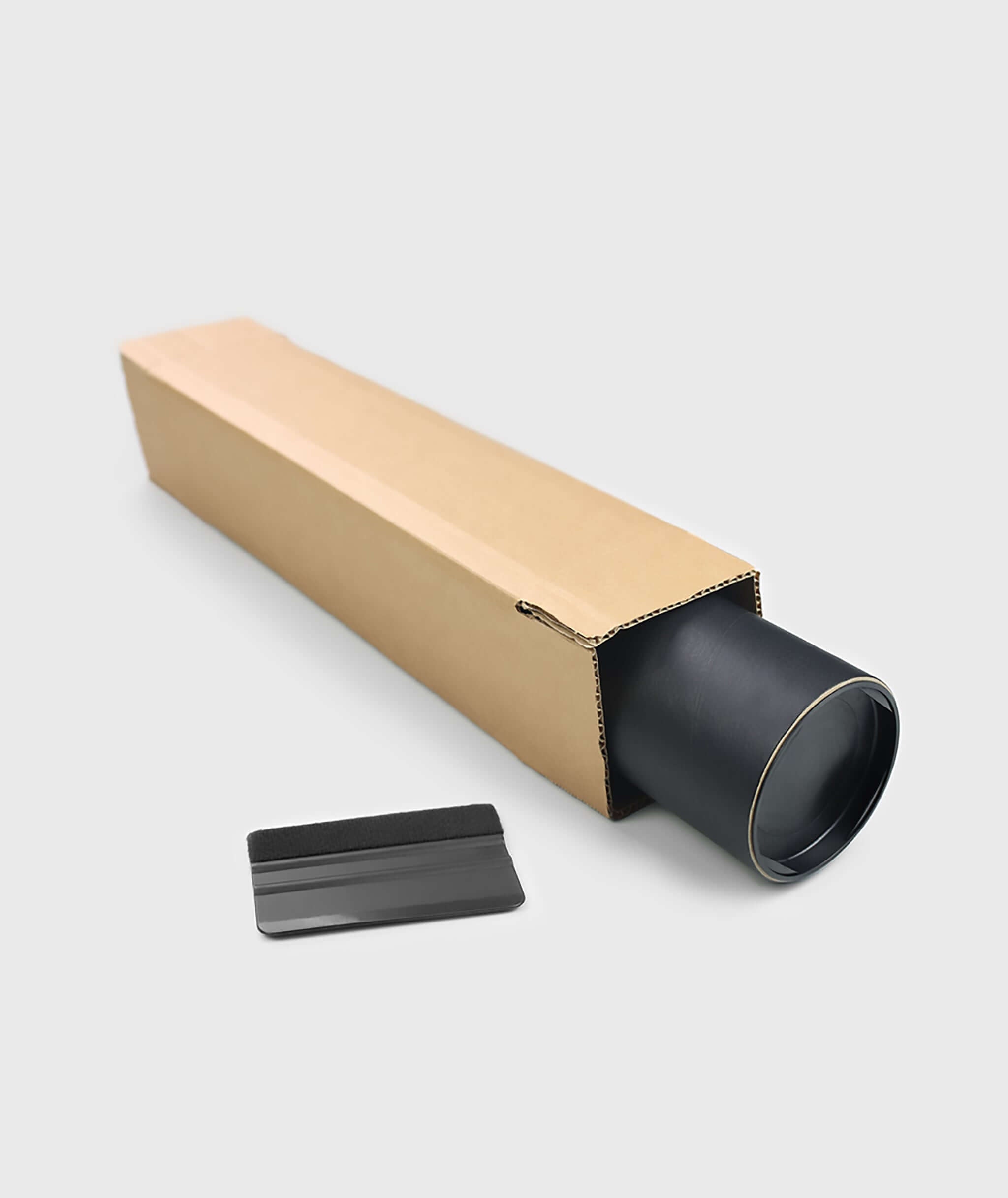 Black wallpaper roll partially unboxed with packaging; panel width 24 inches, pattern repeat 12 inches, no overlap, includes squeegee tool.