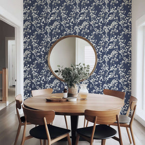 Dining room featuring Silver Whisper wallpaper with silver branches on navy background, creating a modern and contemporary design.