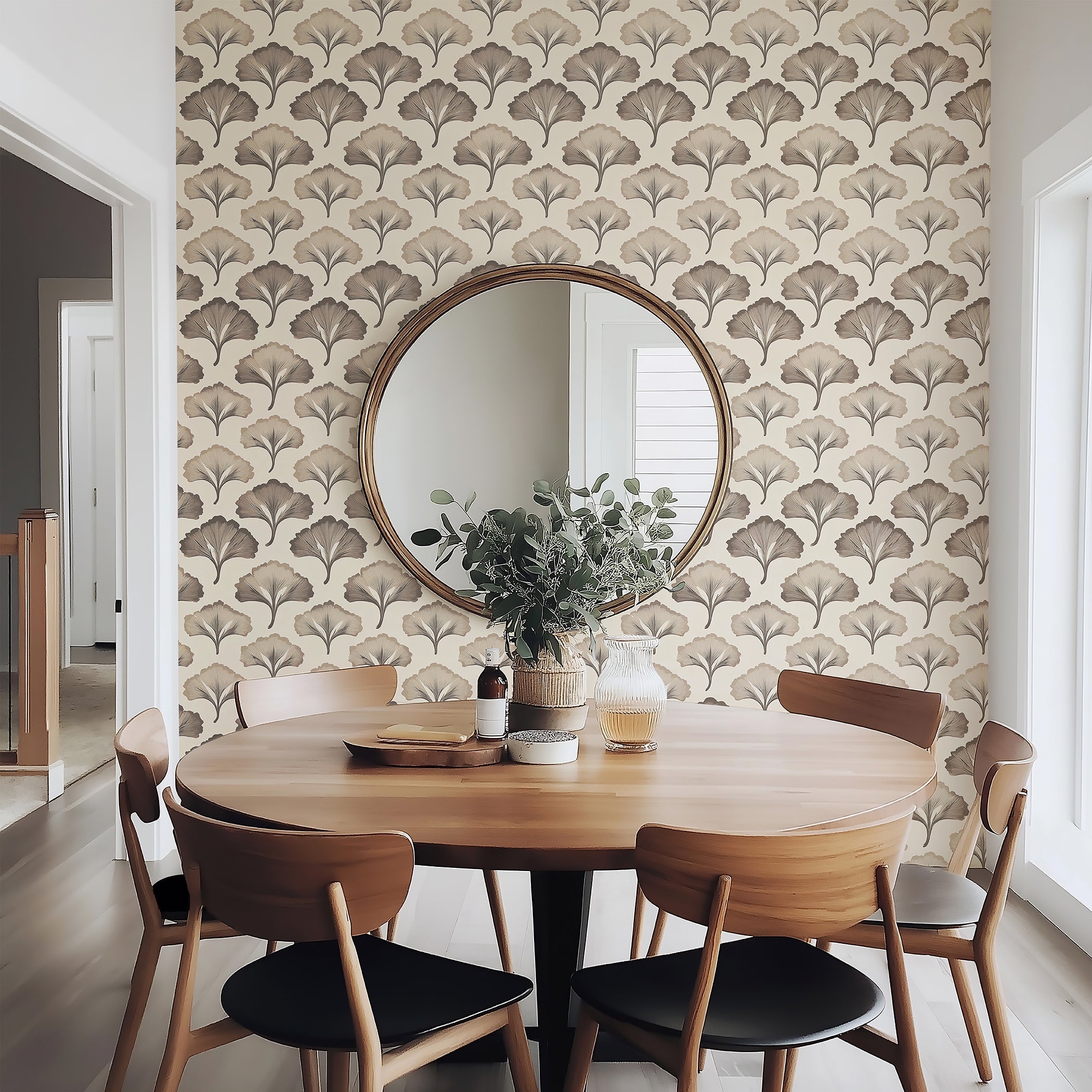 Art deco Ginkgo Grace wallpaper featuring floral ginkgo leaves in calming brown tones, enhancing a stylish dining room interior.