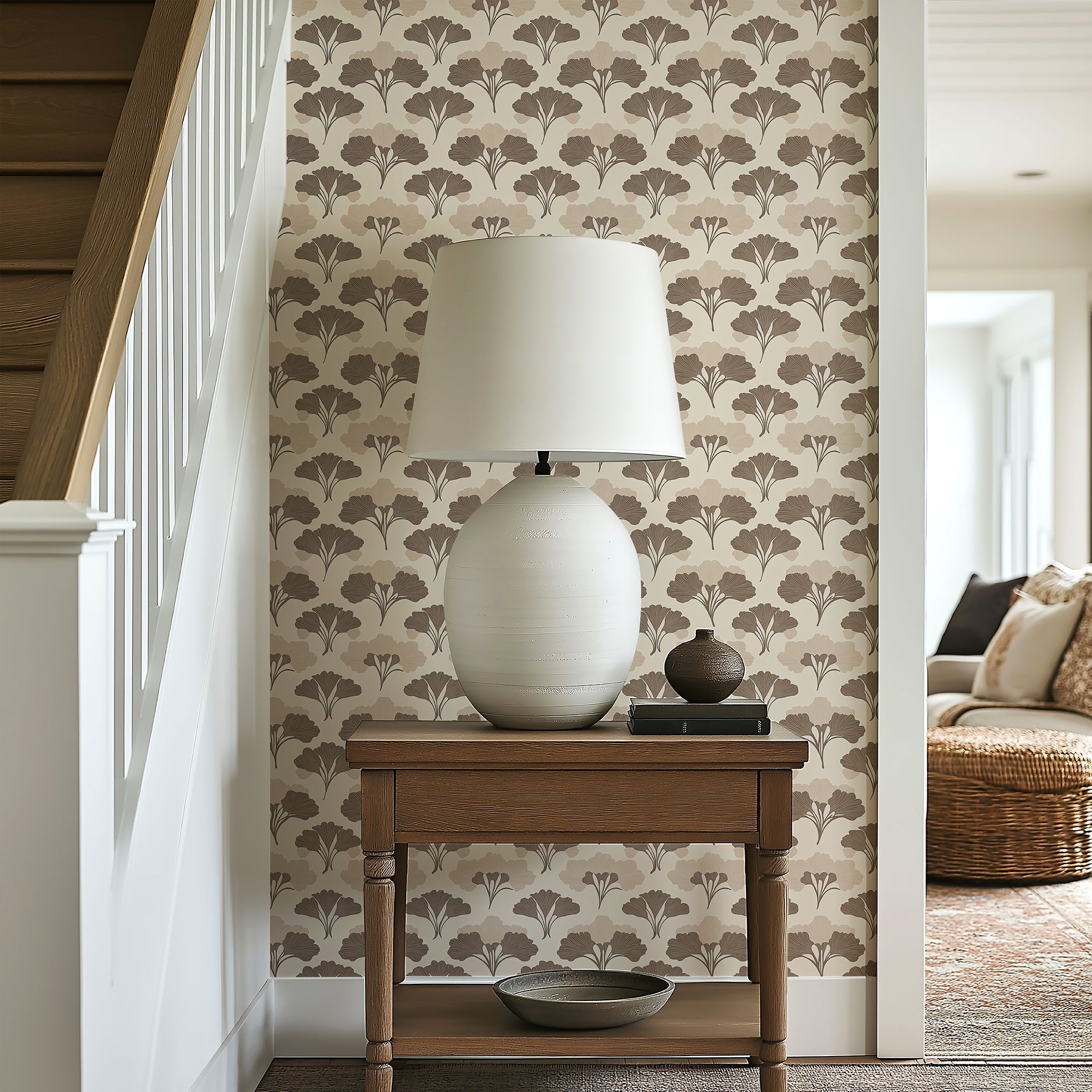 Stylish entryway with Tranquil Ginkgo floral art deco wallpaper, featuring soft earth-toned ginkgo leaves and elegant brown patterns.