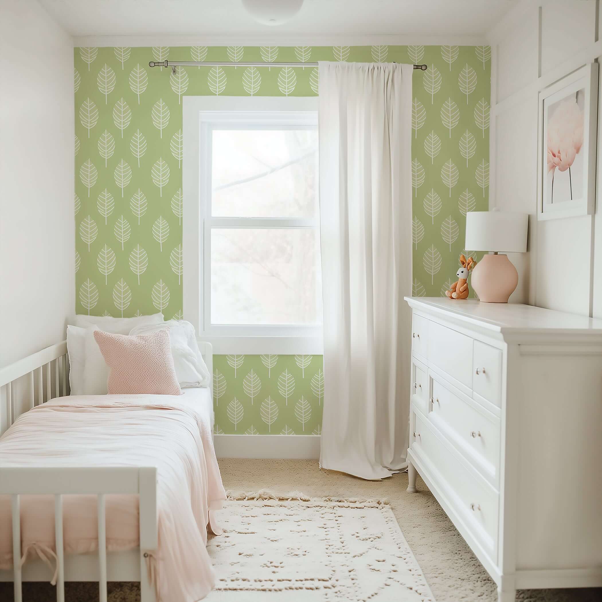 Children’s room with Spring Leaf wallpaper, featuring green background with white leaf designs, creating a modern, calming, abstract look.